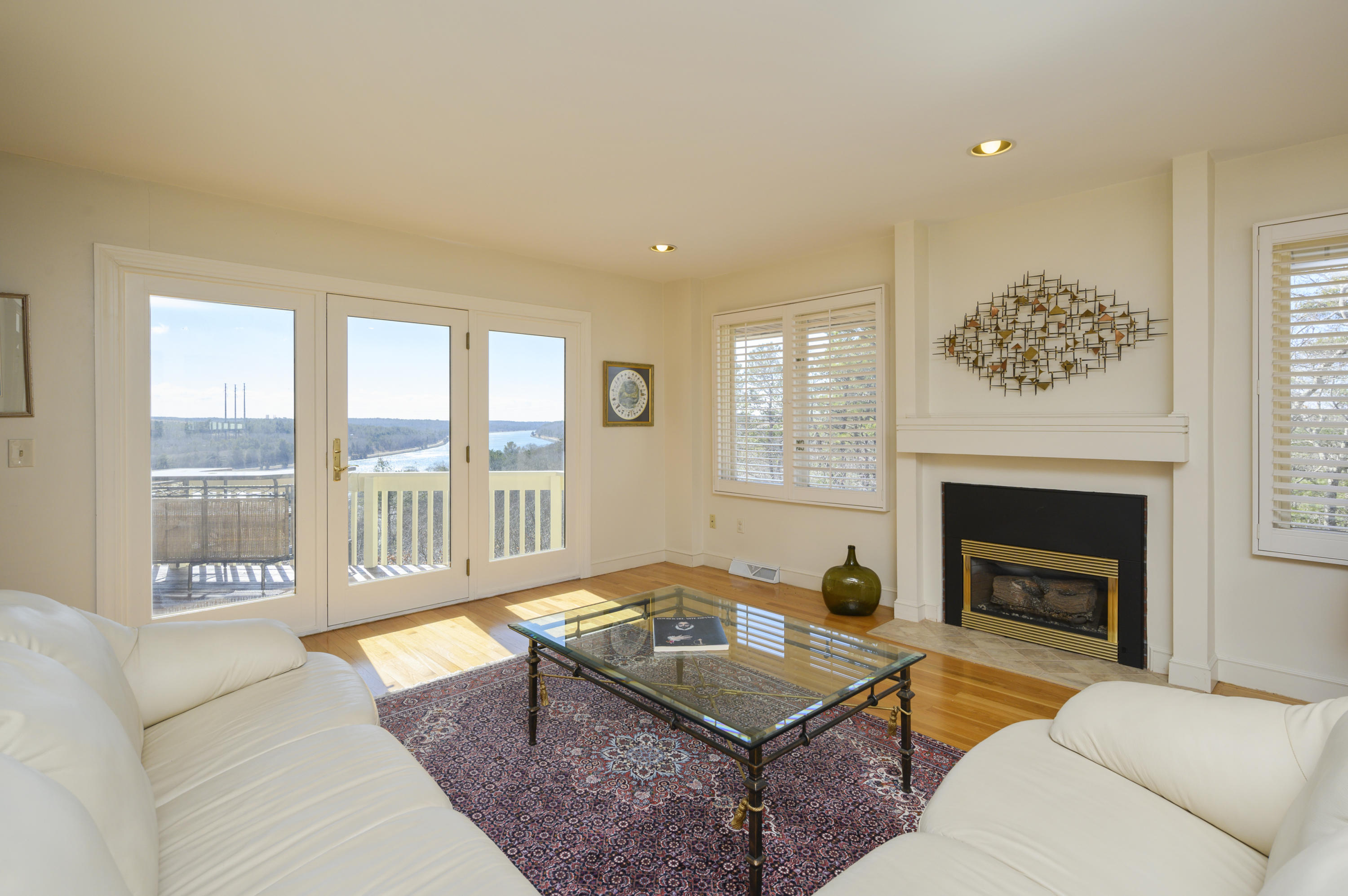 2 Dogwood Road, Unit H Buzzards Bay, MA 02532 - Photo 4 of 41 a living room with furniture and a fireplace