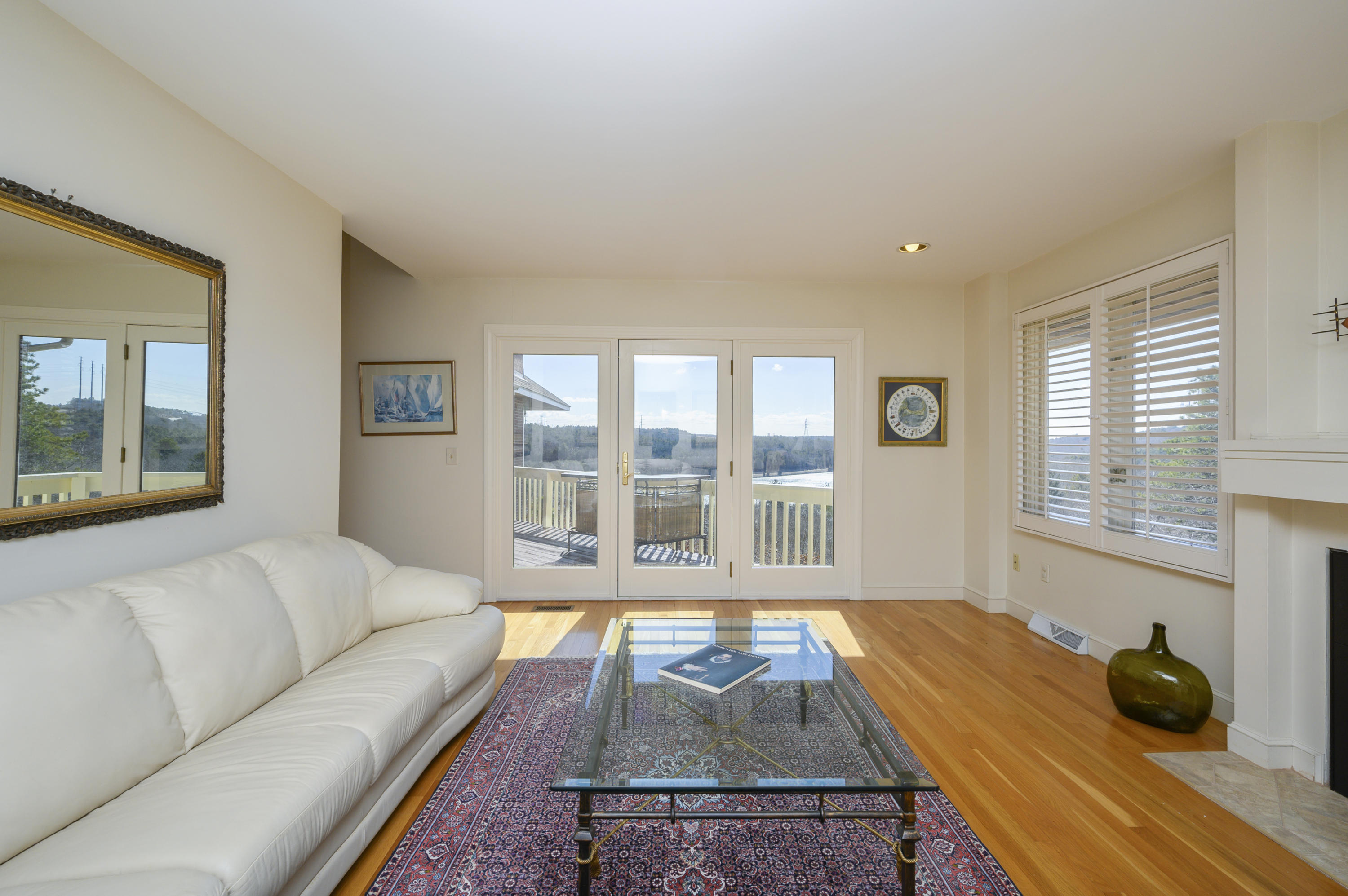 2 Dogwood Road, Unit H Buzzards Bay, MA 02532 - Photo 7 of 41 a living room with furniture and a large window