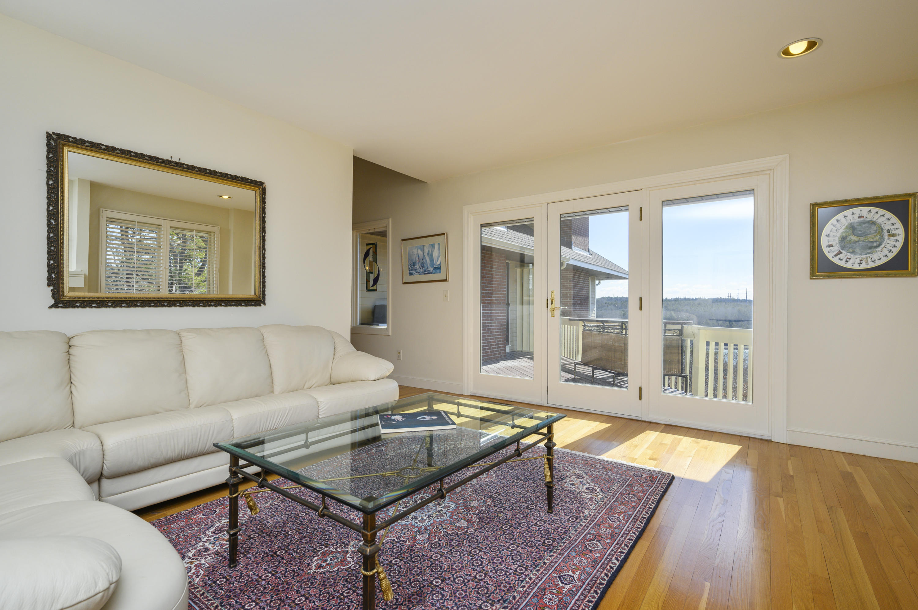 2 Dogwood Road, Unit H Buzzards Bay, MA 02532 - Photo 9 of 41 a living room with furniture and a table