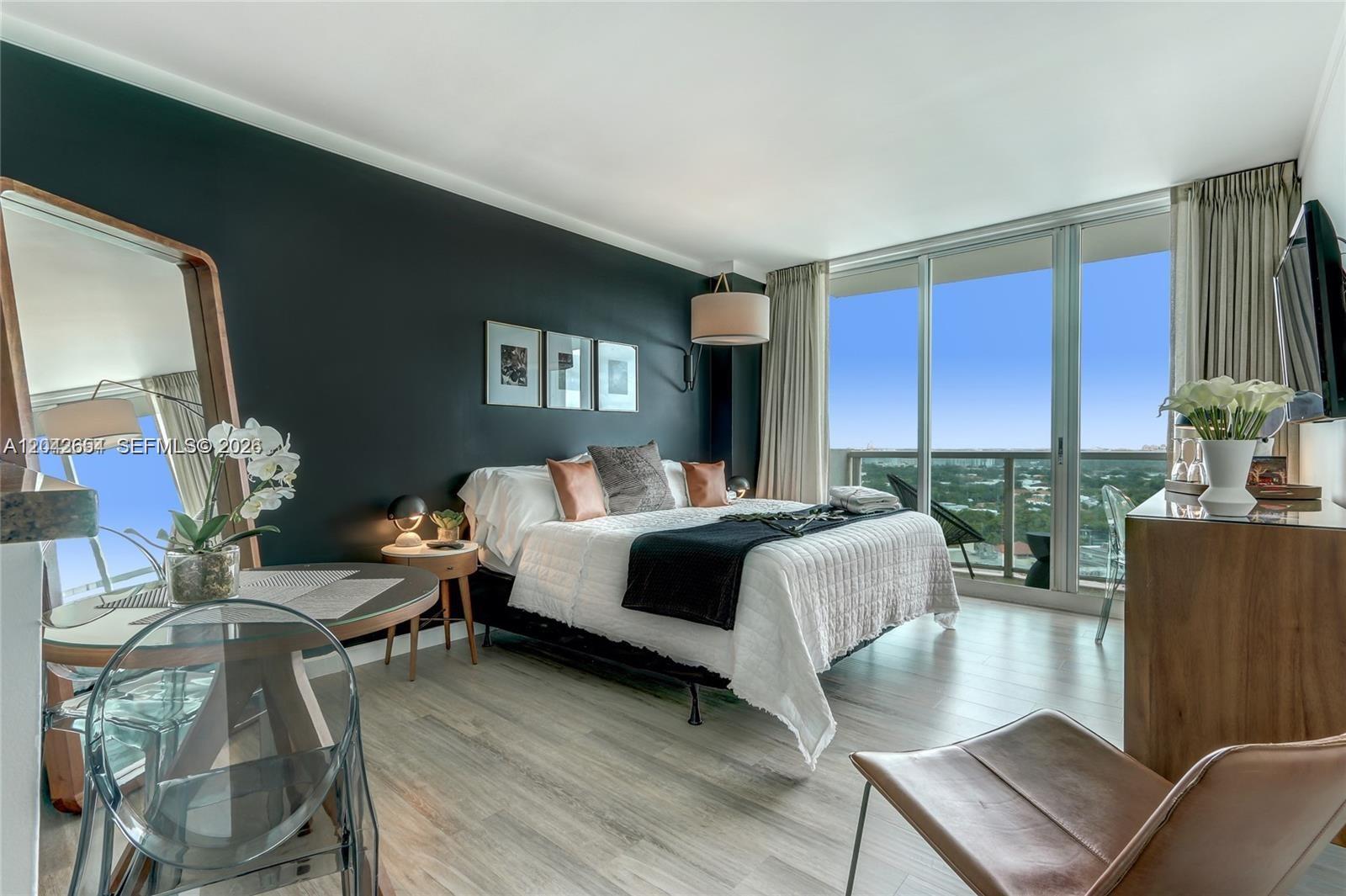 2889 McFarlane Road, Unit 1811 Miami, FL 33133 - Photo 1 of 18 Bedroom 1 with small dining