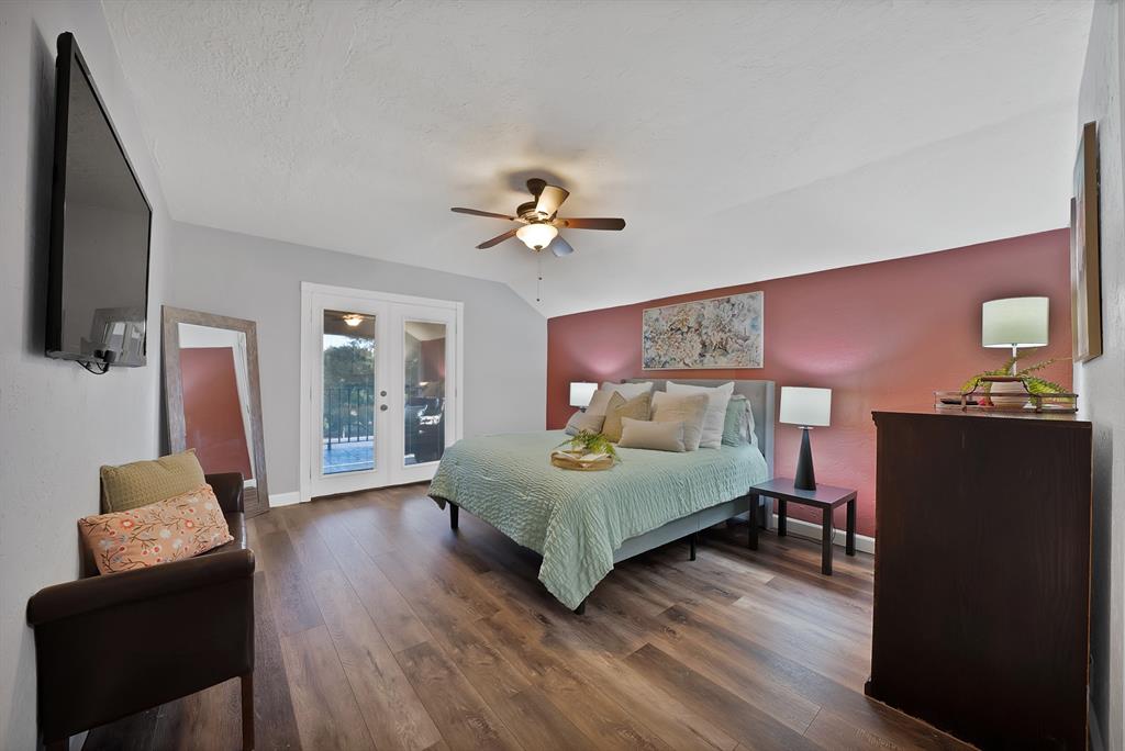 306 Rochelle Boulevard Irving, TX 75062 - Photo 22 of 40 Hardwood-style flooring throughout, ceiling fan with integrated lighting, and French doors leading to exterior