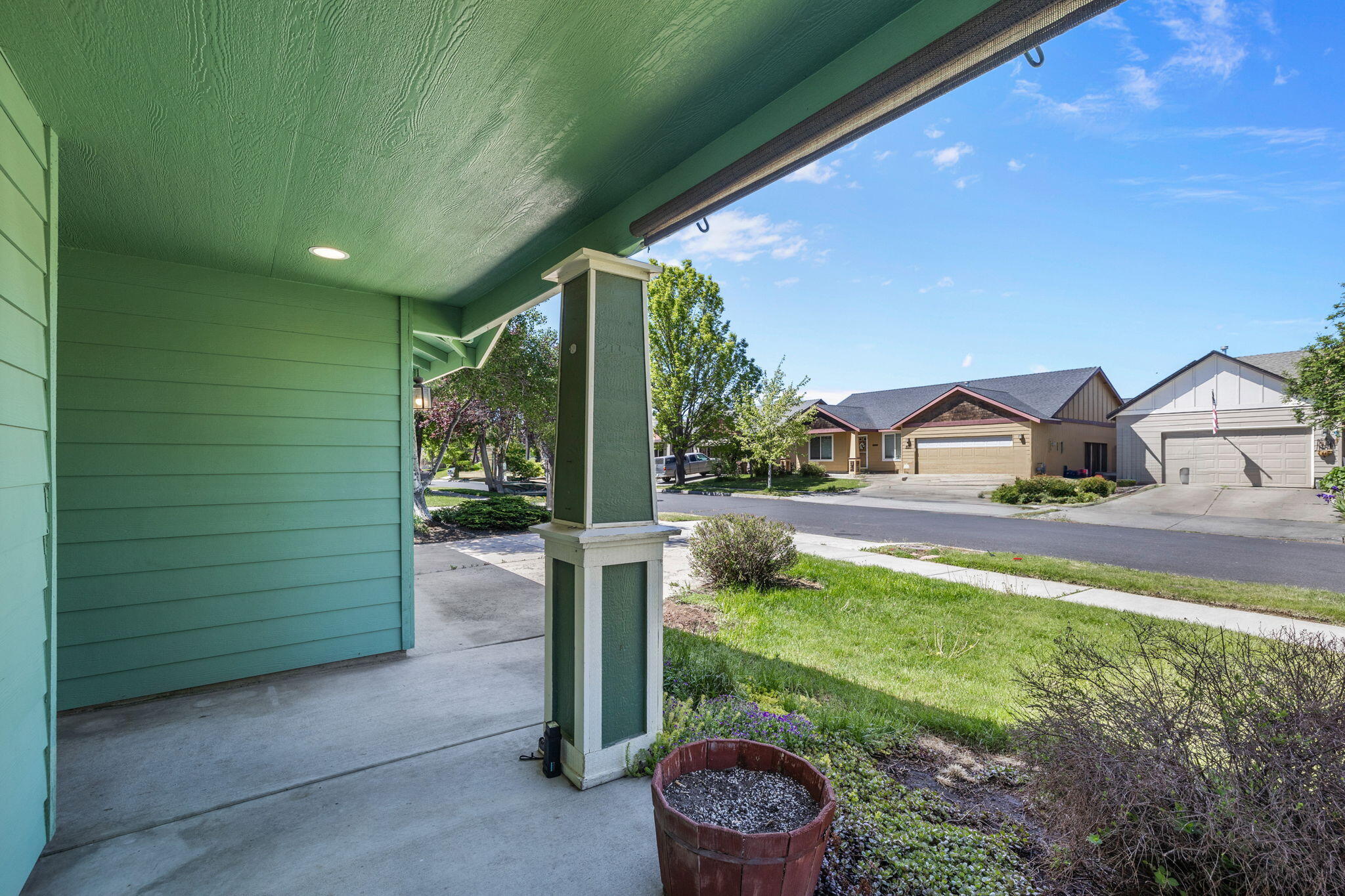 348 Northwest Antler Loop Redmond, OR 97756 - Photo 5 of 34 view out from covered front porch