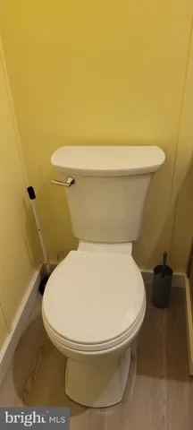 a bathroom with a toilet and a sink