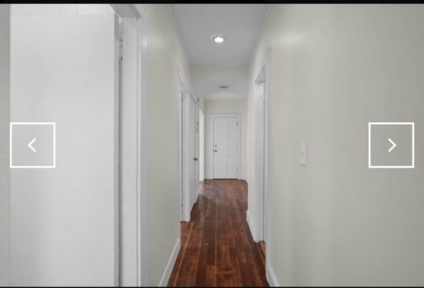 28 Borden Street, Unit 1 New Bedford, MA 02740 - Photo 5 of 11 a view of a hallway with wooden floor