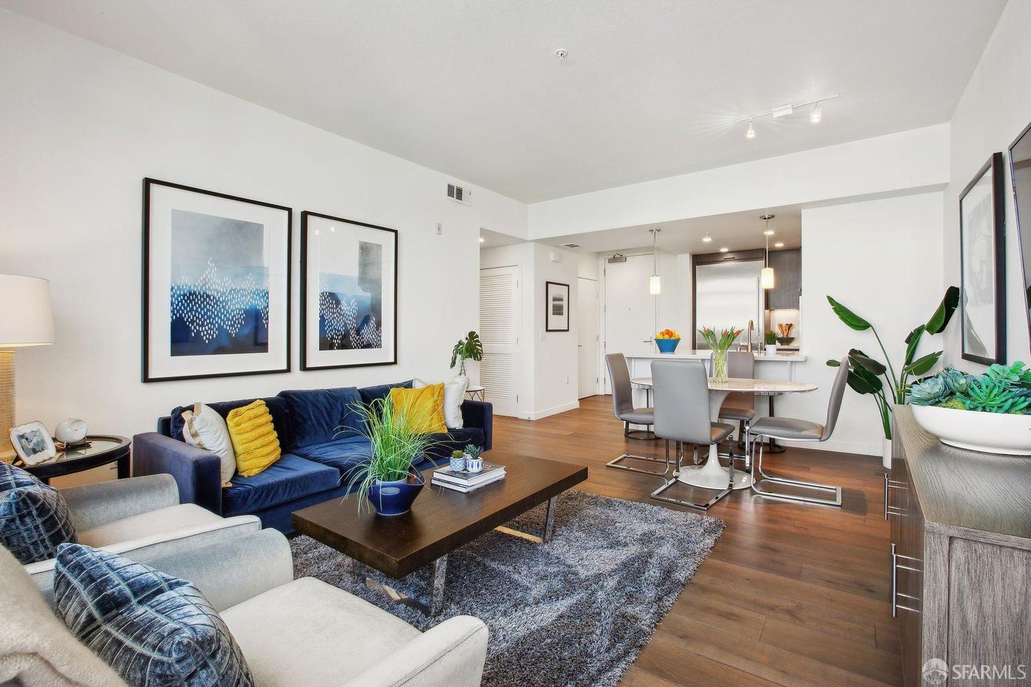 2655 Bush Street, Unit 603 San Francisco, CA 94115 - Photo 2 of 36 a living room with furniture and wooden floor