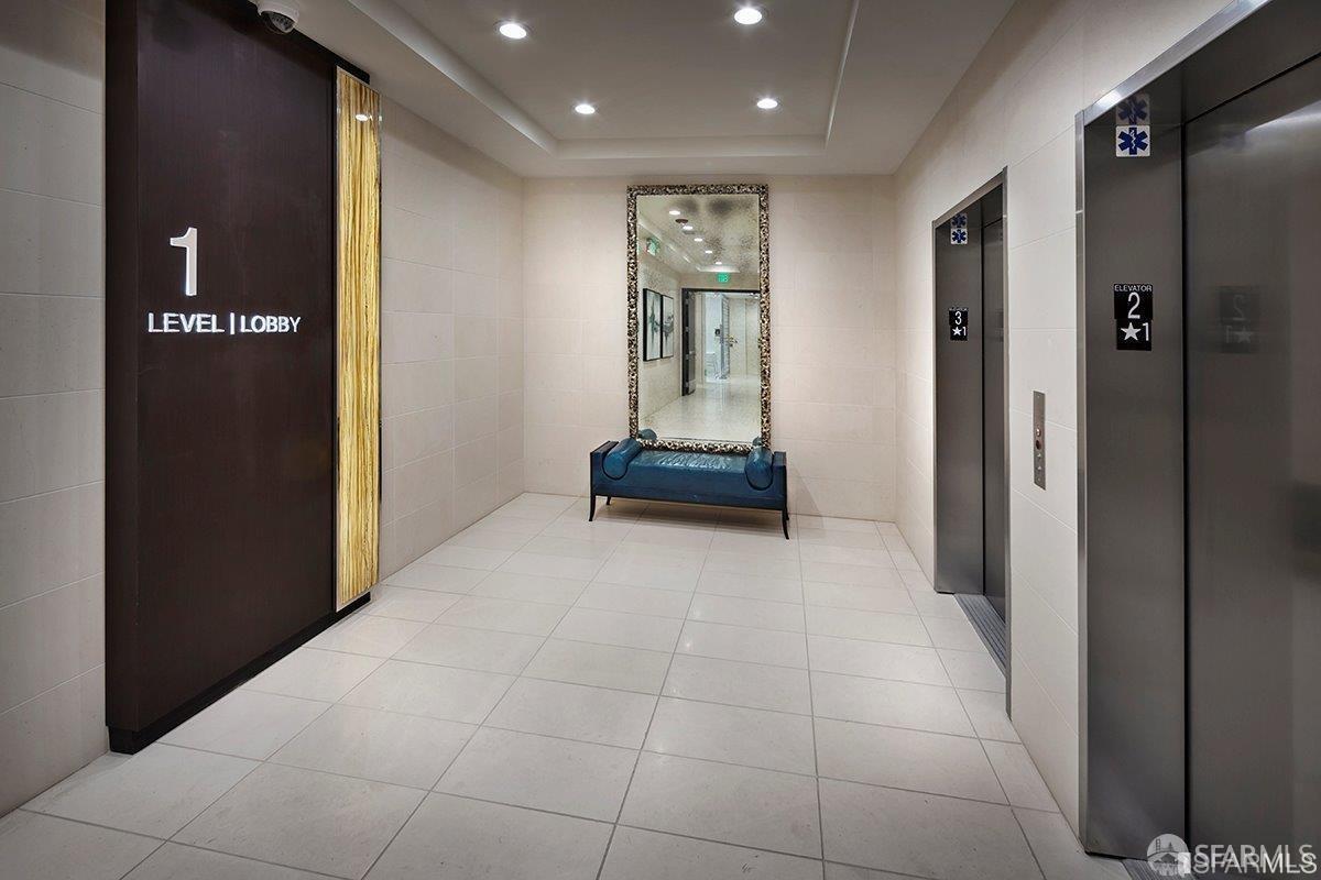 2655 Bush Street, Unit 603 San Francisco, CA 94115 - Photo 21 of 36 a view of a hallway with a elevator