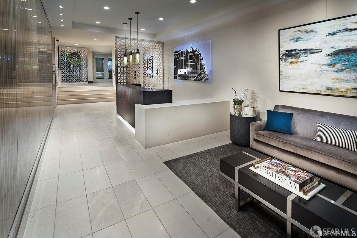 2655 Bush Street, Unit 603 San Francisco, CA 94115 - Photo 25 of 36 a living room with furniture and a rug