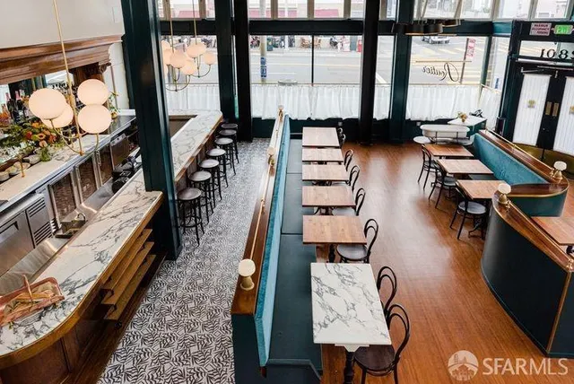 a view of city with the shops and fruits market