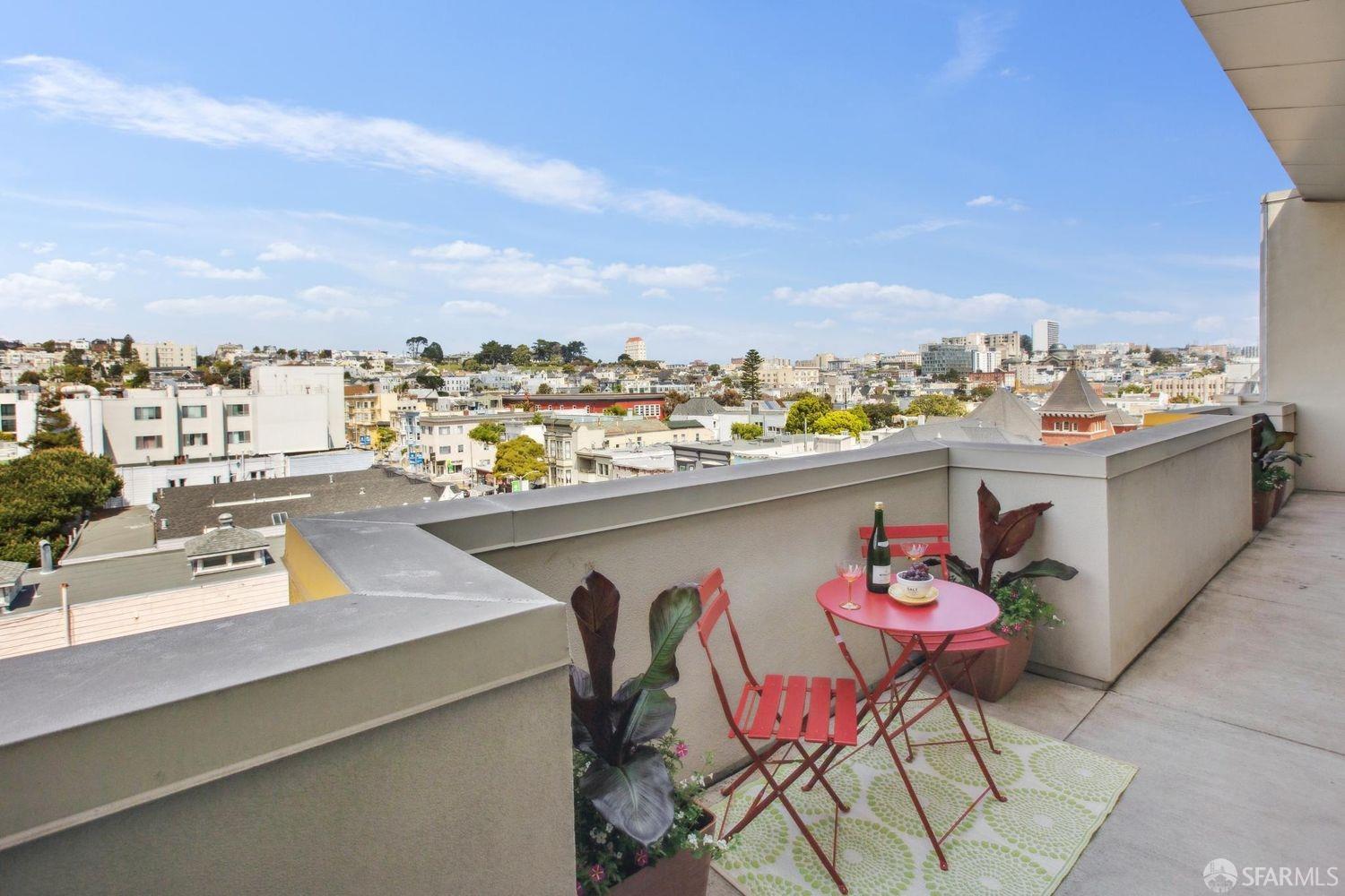 2655 Bush Street, Unit 603 San Francisco, CA 94115 - Photo 5 of 36 a view of a terrace with furniture and stove