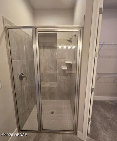 a view of a room with racks on the wall