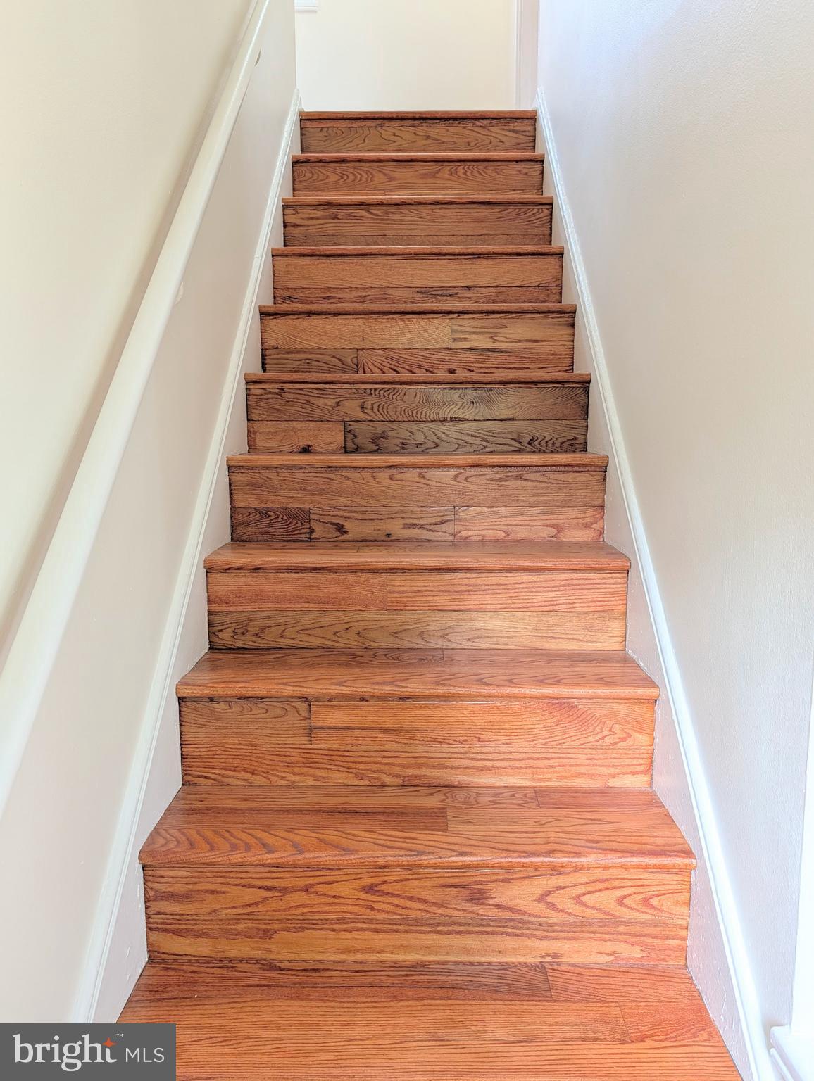 8 Hillside Road Greenbelt, MD 20770 - Photo 17 of 23 Refinished hardwood stairs