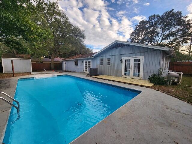 1038 37th Street Niceville, FL 32578 - Photo 25 of 25 a view of a house with pool and chairs
