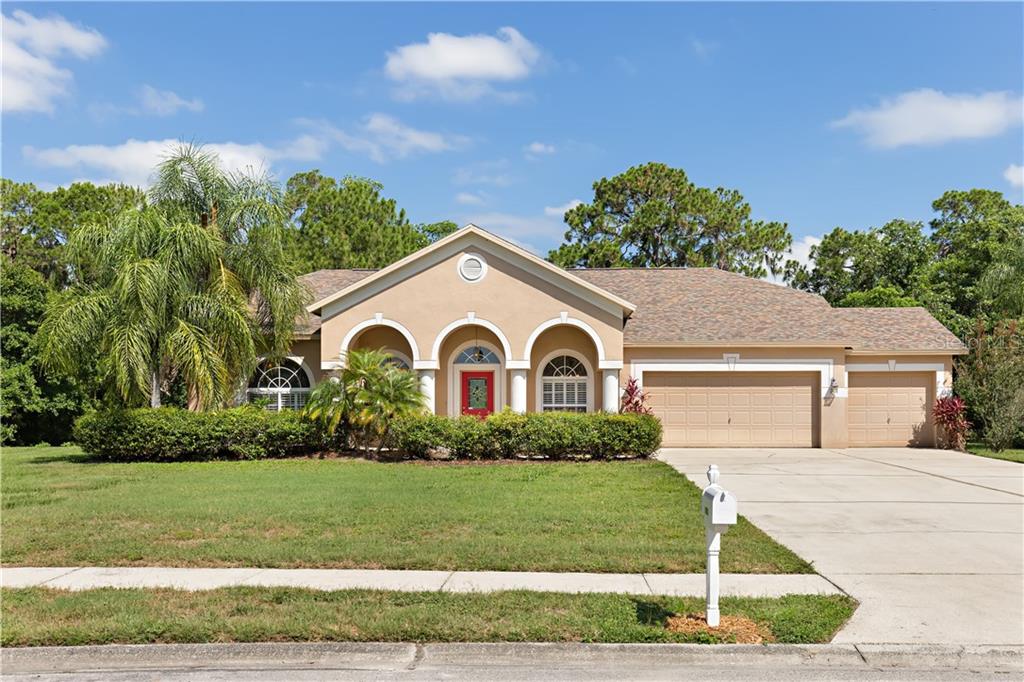 12932 Raysbrook Drive Riverview, FL 33569 - Photo 1 of 1 a front view of a house with a yard