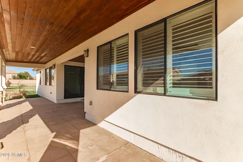 a view of a bathroom with a sink and mirror