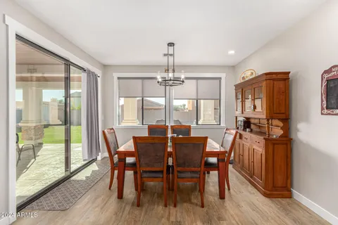 a view of a bedroom with furniture and ceiling fan