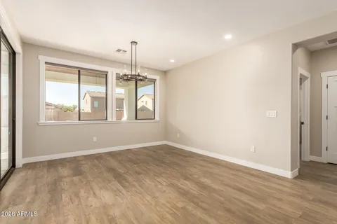 a kitchen with stainless steel appliances a sink stove and cabinets