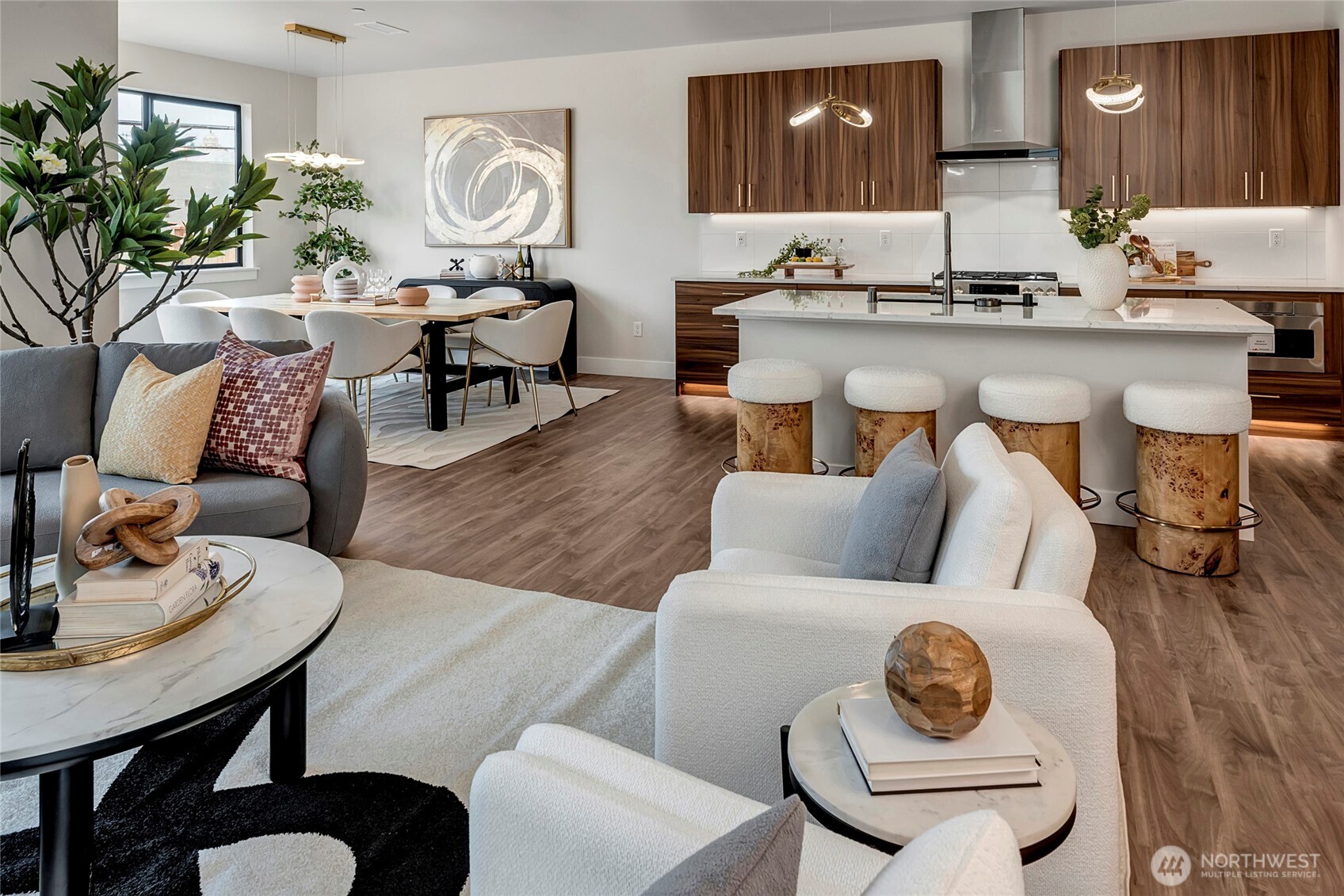 3928 214th Place Southeast, Unit B Bothell, WA 98021 - Photo 12 of 27 a living room with furniture a chandelier and a dining room