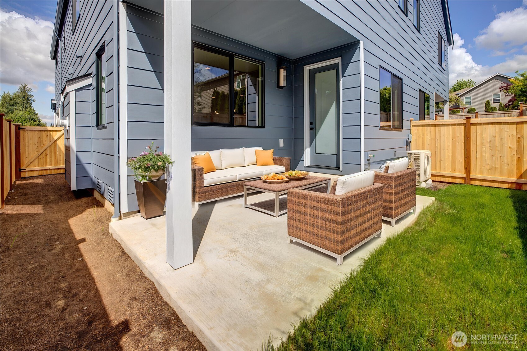 3928 214th Place Southeast, Unit B Bothell, WA 98021 - Photo 15 of 27 a outdoor space with patio the couch and a fireplace