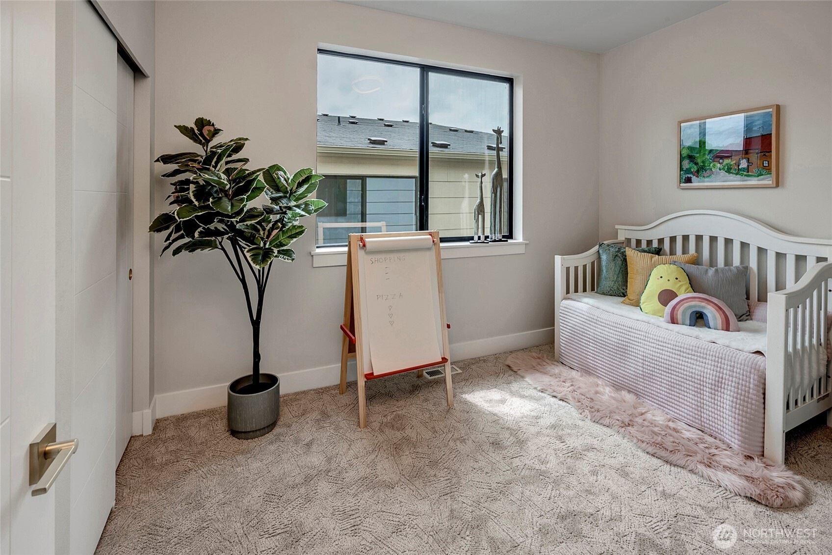 3928 214th Place Southeast, Unit B Bothell, WA 98021 - Photo 24 of 27 a living room with furniture and a potted plant