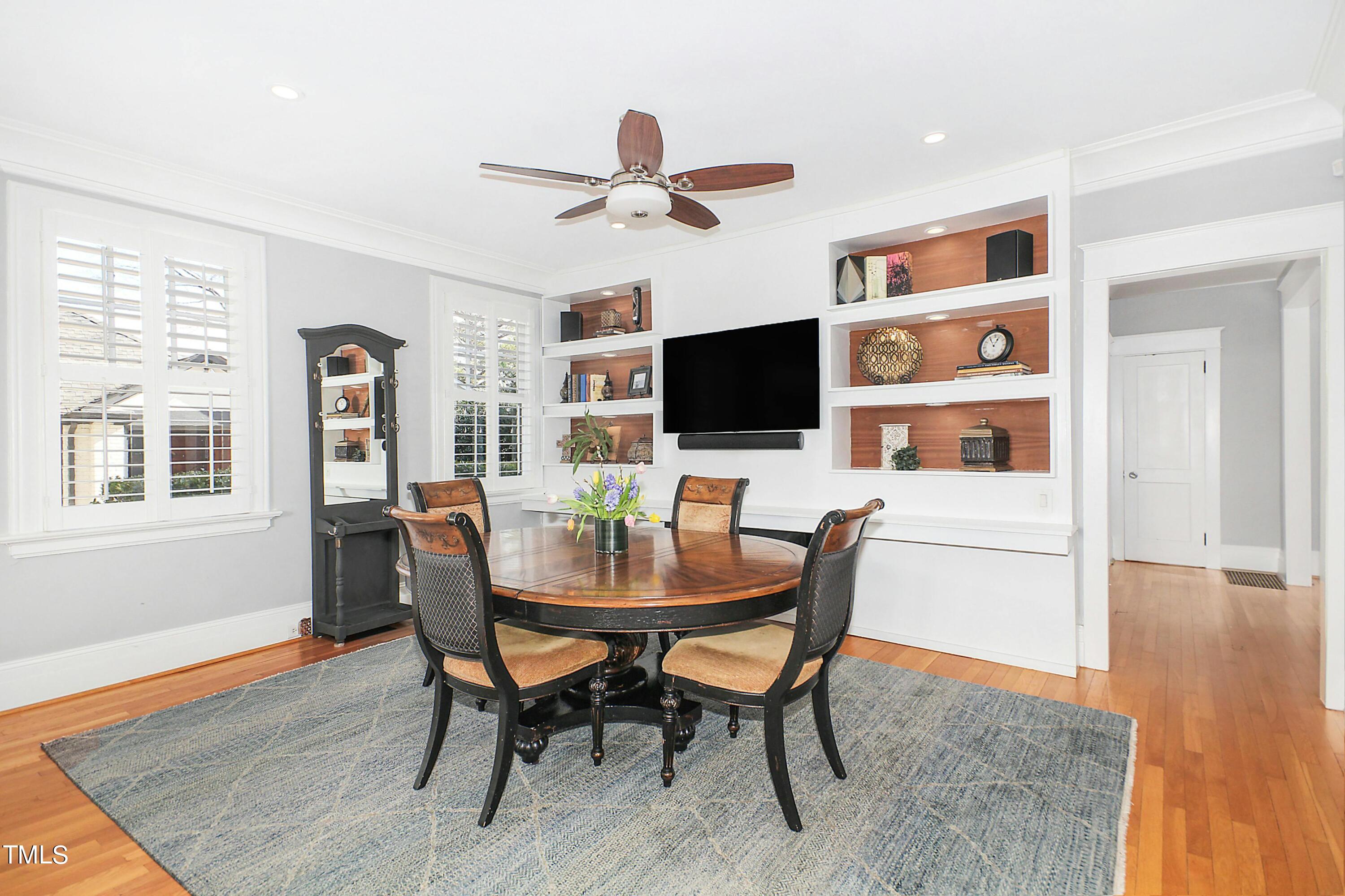 1512 Carr Street Raleigh, NC 27608 - Photo 13 of 60 a view of a dining room with furniture window and wooden floor