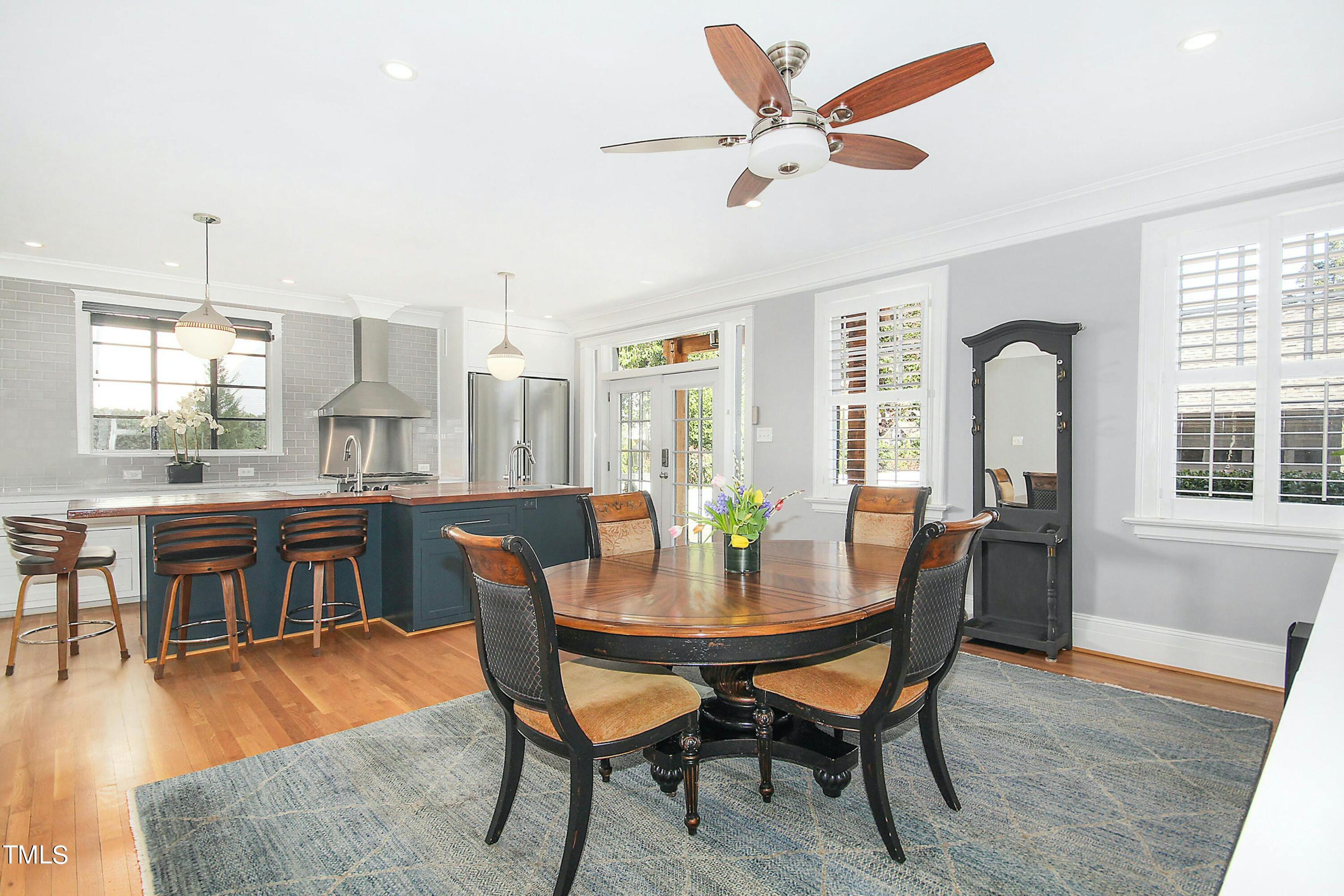 1512 Carr Street Raleigh, NC 27608 - Photo 14 of 60 a dining room with furniture window and wooden floor