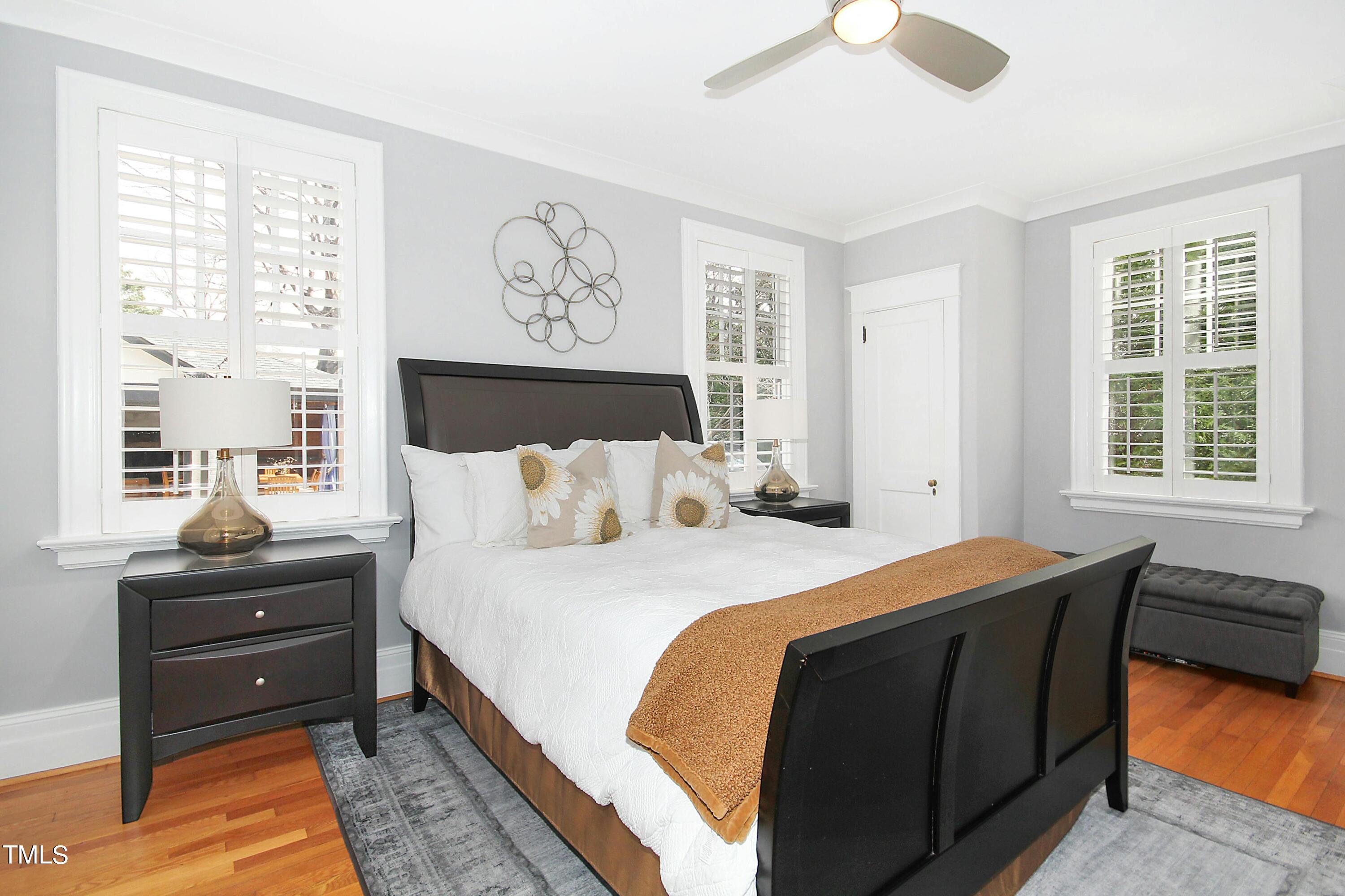 1512 Carr Street Raleigh, NC 27608 - Photo 18 of 60 a bedroom with bed and window