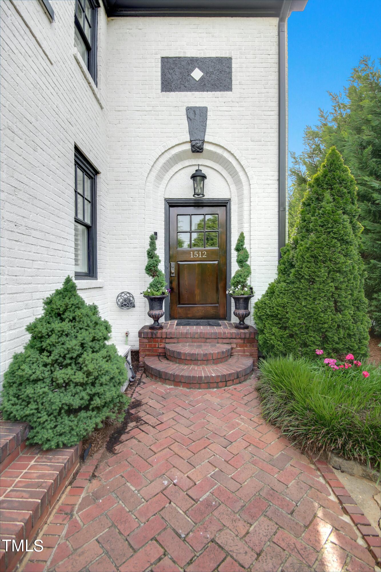 1512 Carr Street Raleigh, NC 27608 - Photo 2 of 60 a front view of a house with a yard