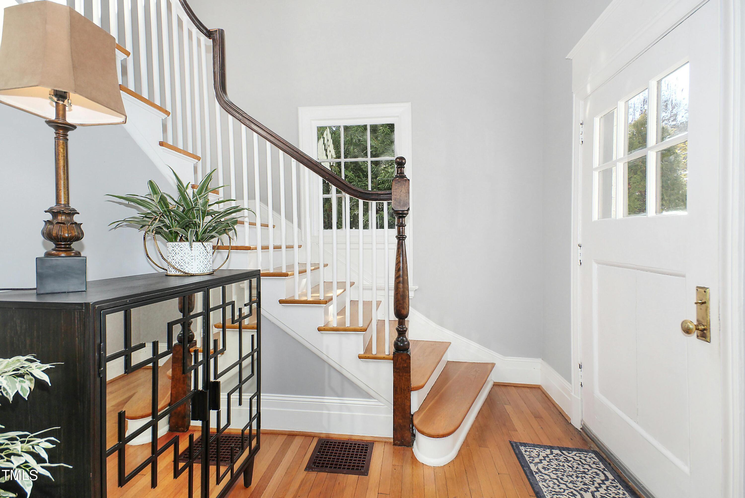 1512 Carr Street Raleigh, NC 27608 - Photo 4 of 60 a view of entryway and hall with wooden floor