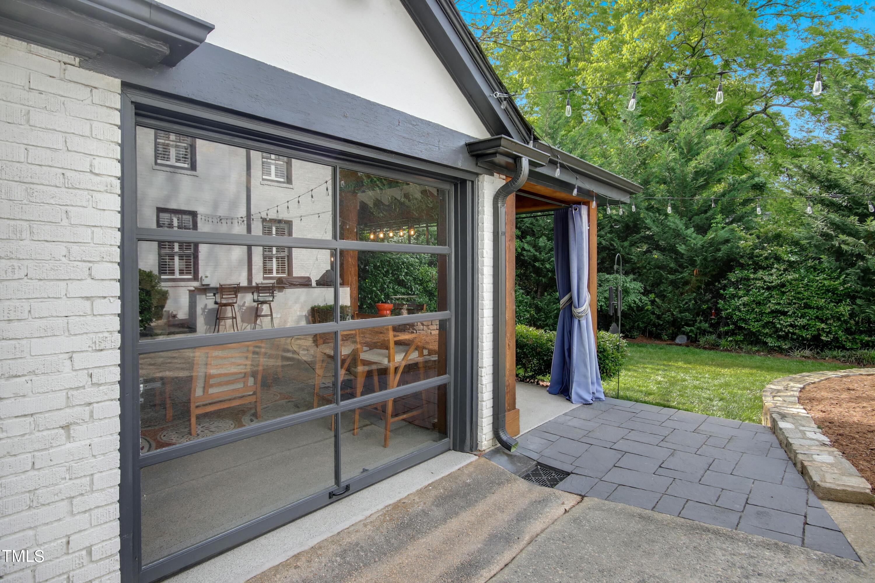 1512 Carr Street Raleigh, NC 27608 - Photo 41 of 60 a view of a porch with a yard