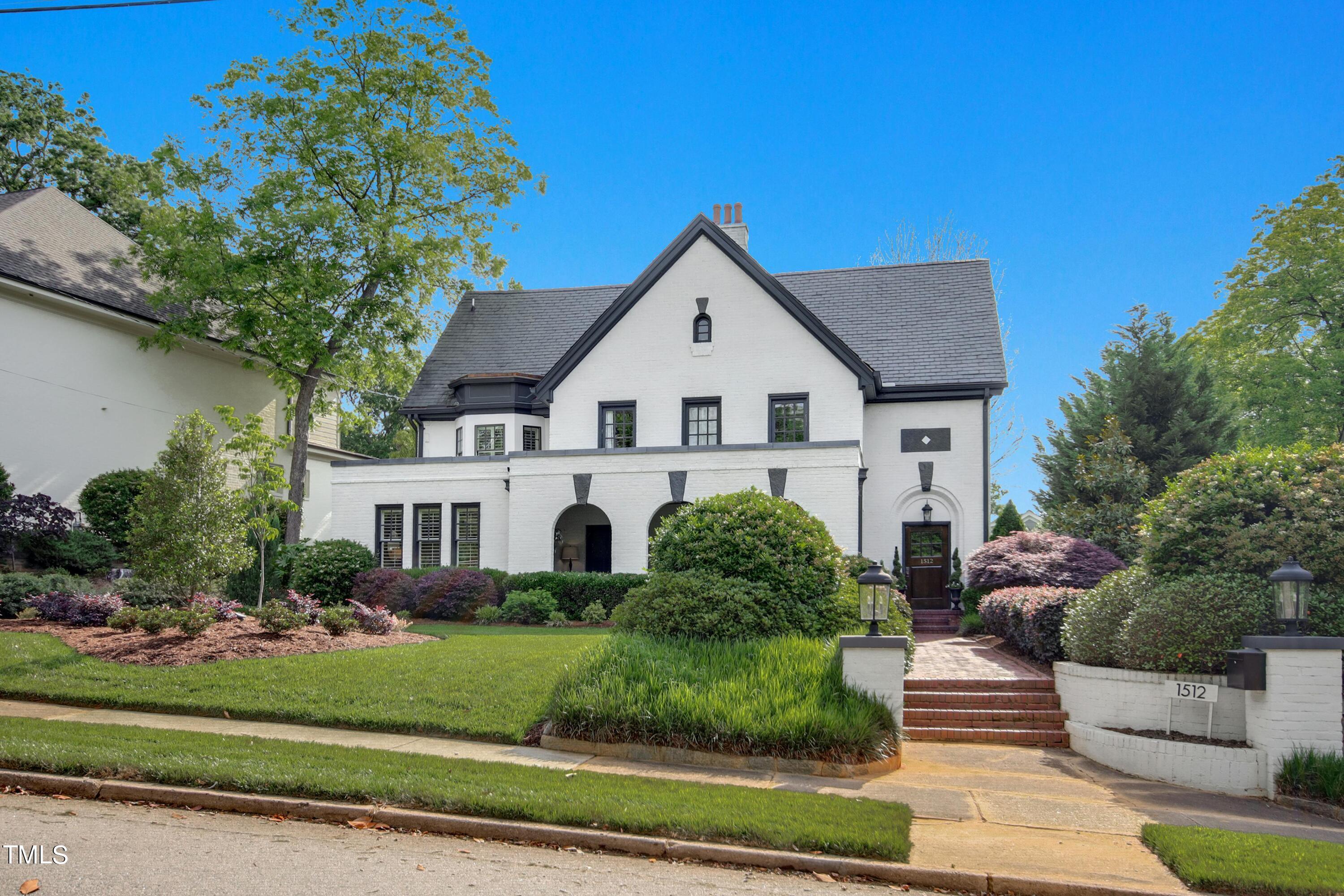 1512 Carr Street Raleigh, NC 27608 - Photo 56 of 60 a front view of a house with a yard