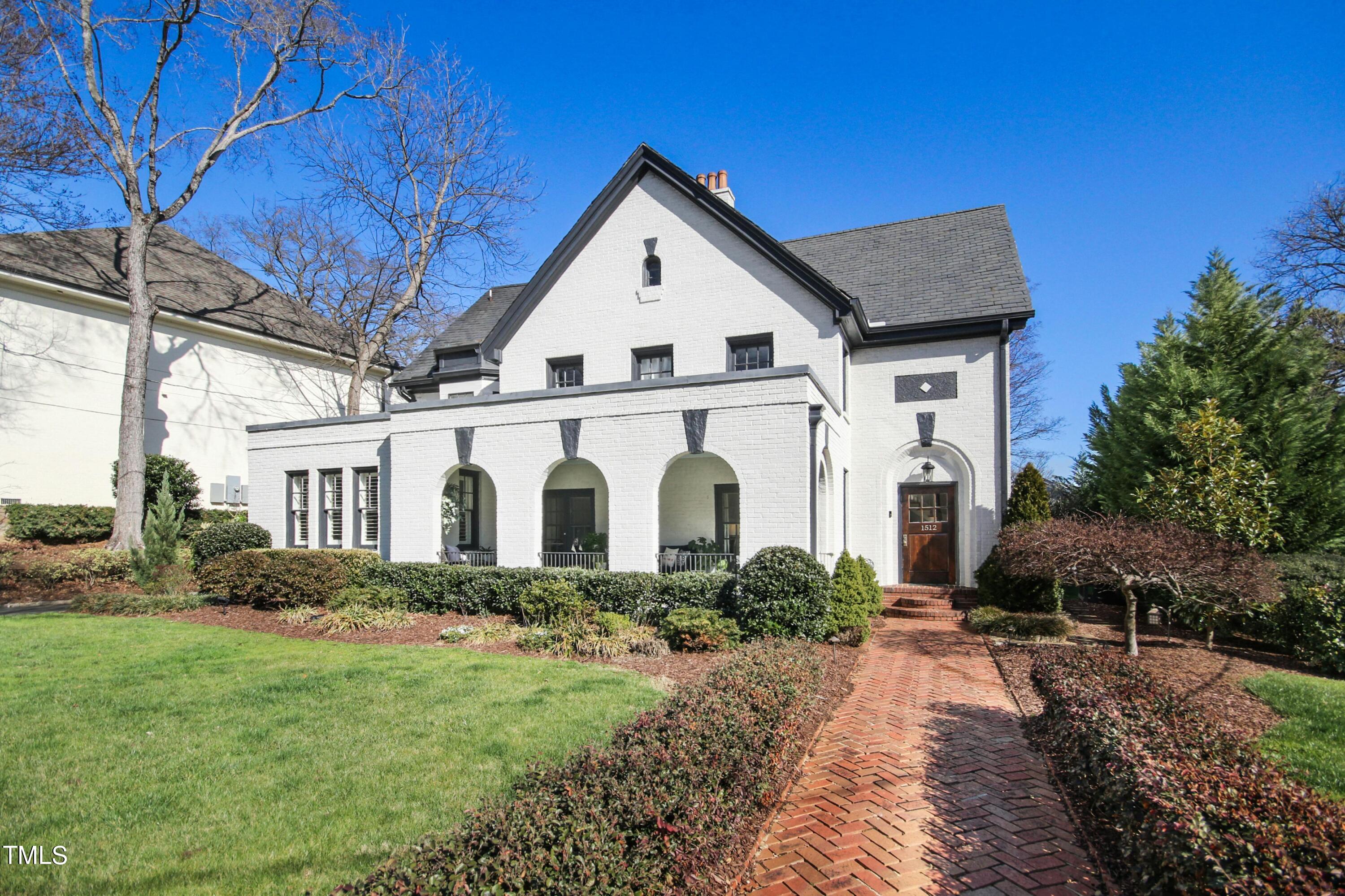 1512 Carr Street Raleigh, NC 27608 - Photo 57 of 60 a front view of a house with garden