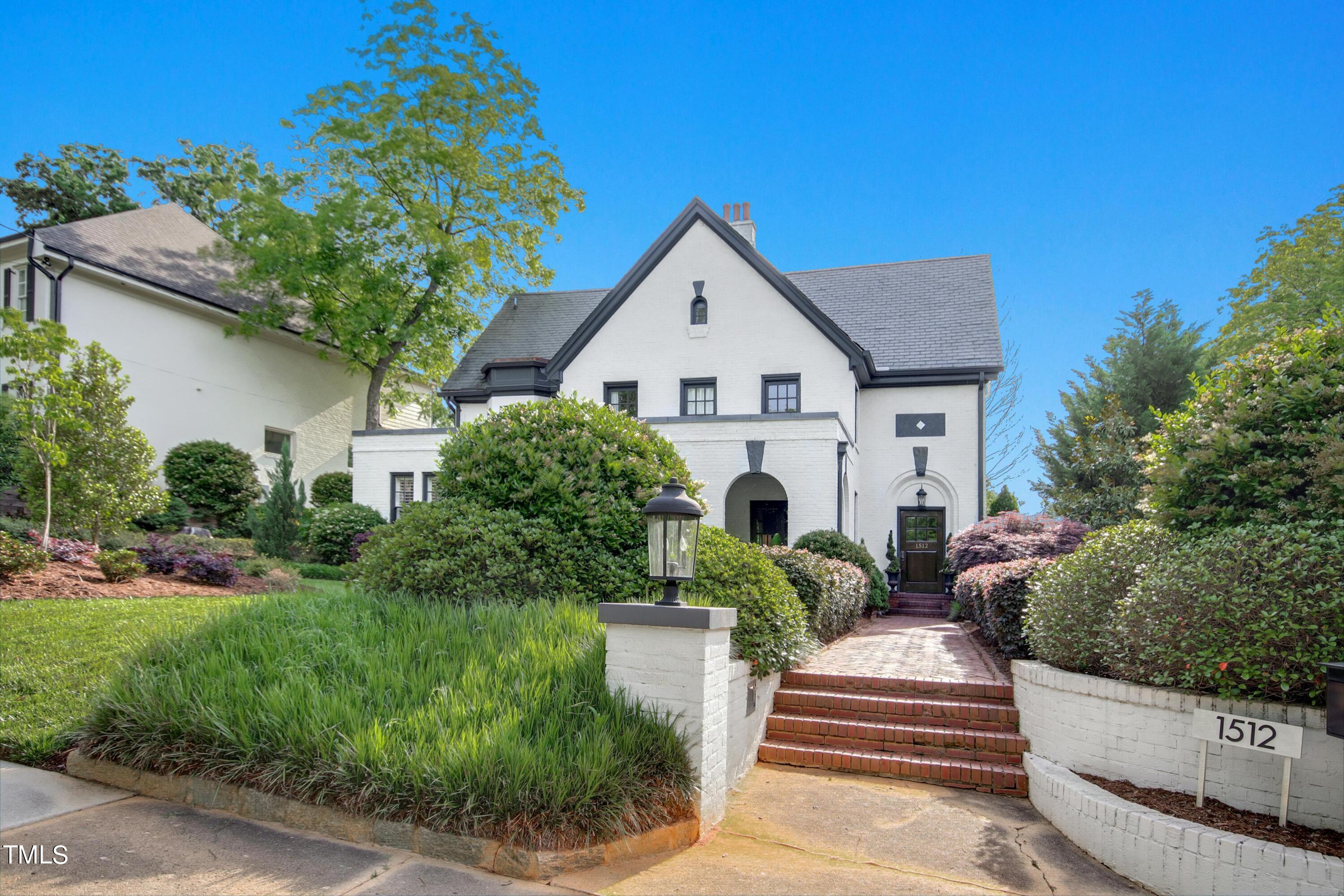 1512 Carr Street Raleigh, NC 27608 - Photo 60 of 60 a front view of house with yard and green space