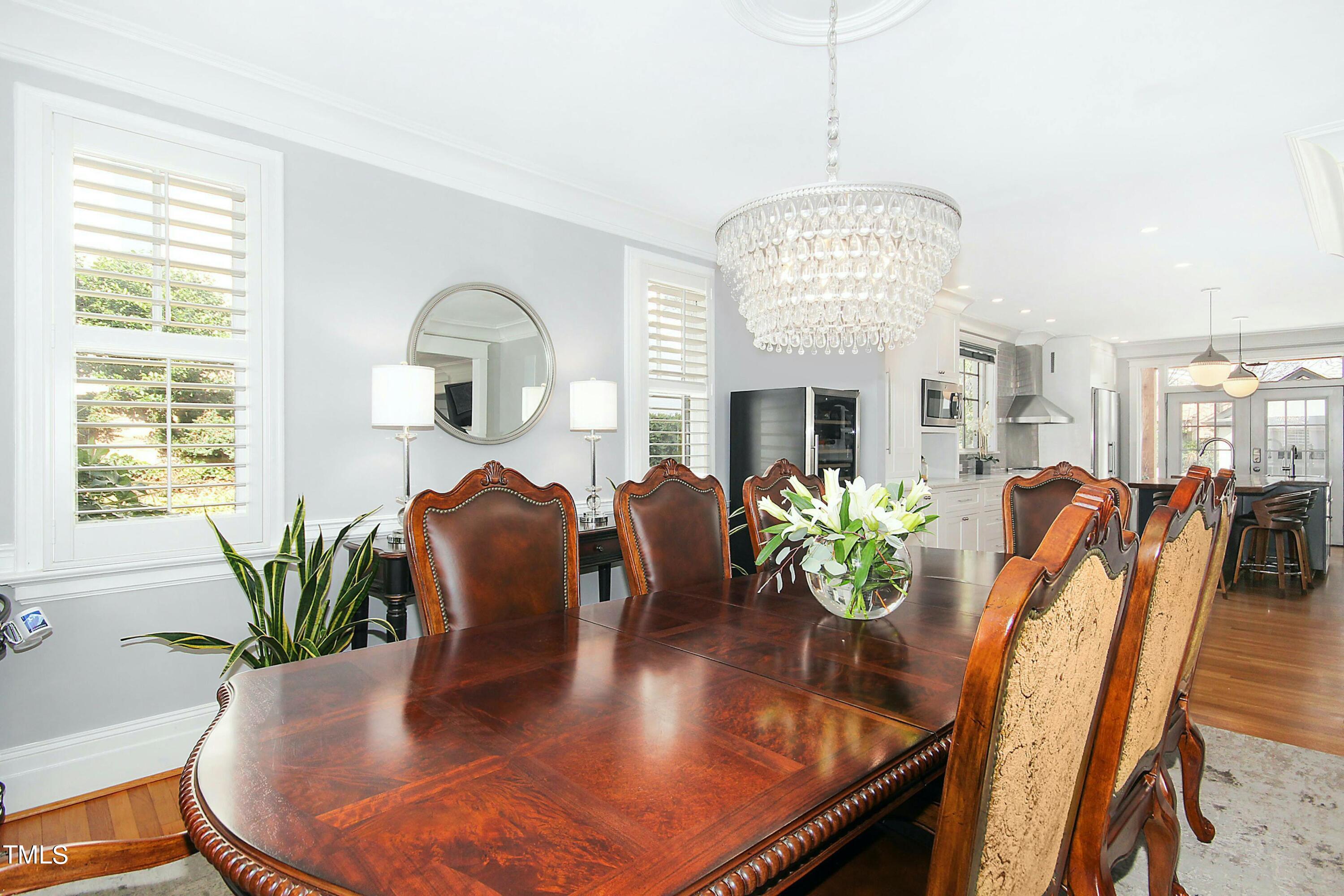 1512 Carr Street Raleigh, NC 27608 - Photo 8 of 60 a view of a dining room with furniture window and wooden floor