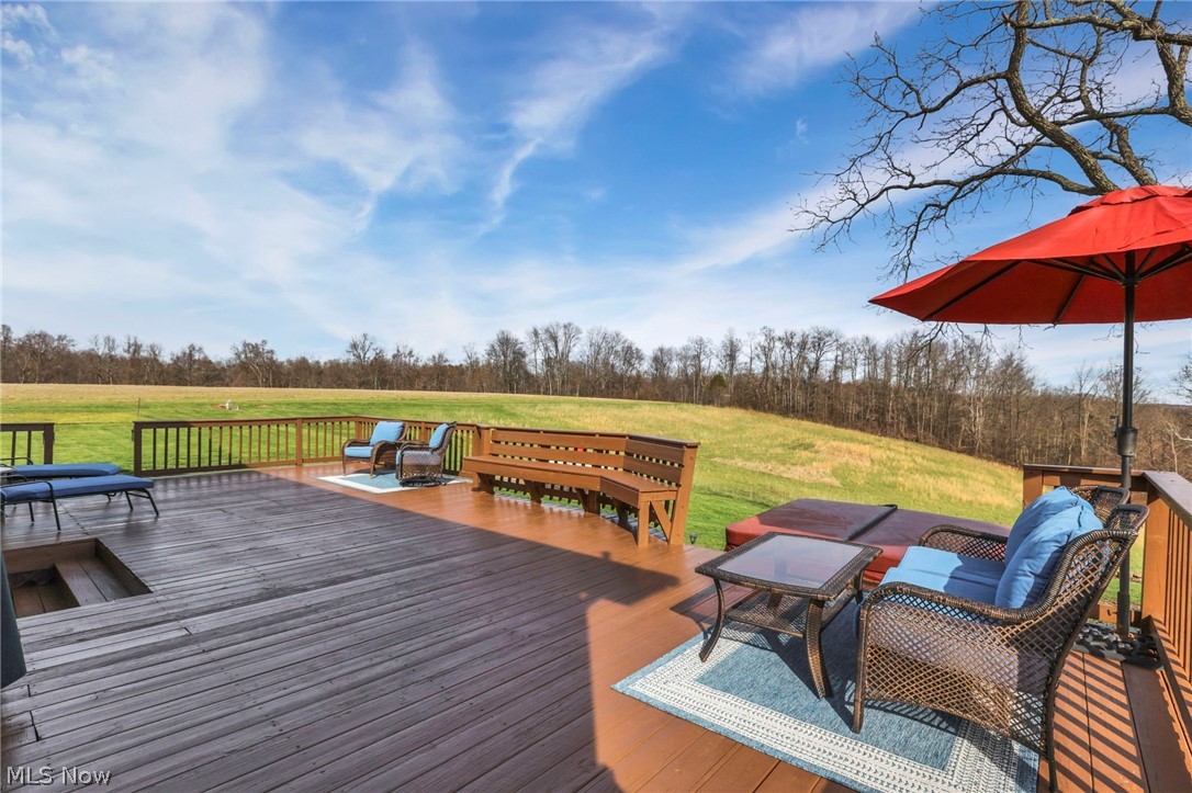 5502 Dutch Ridge Road New Straitsville, OH 43766 - Photo 47 of 49 Wooden terrace with a lawn and an outdoor living space