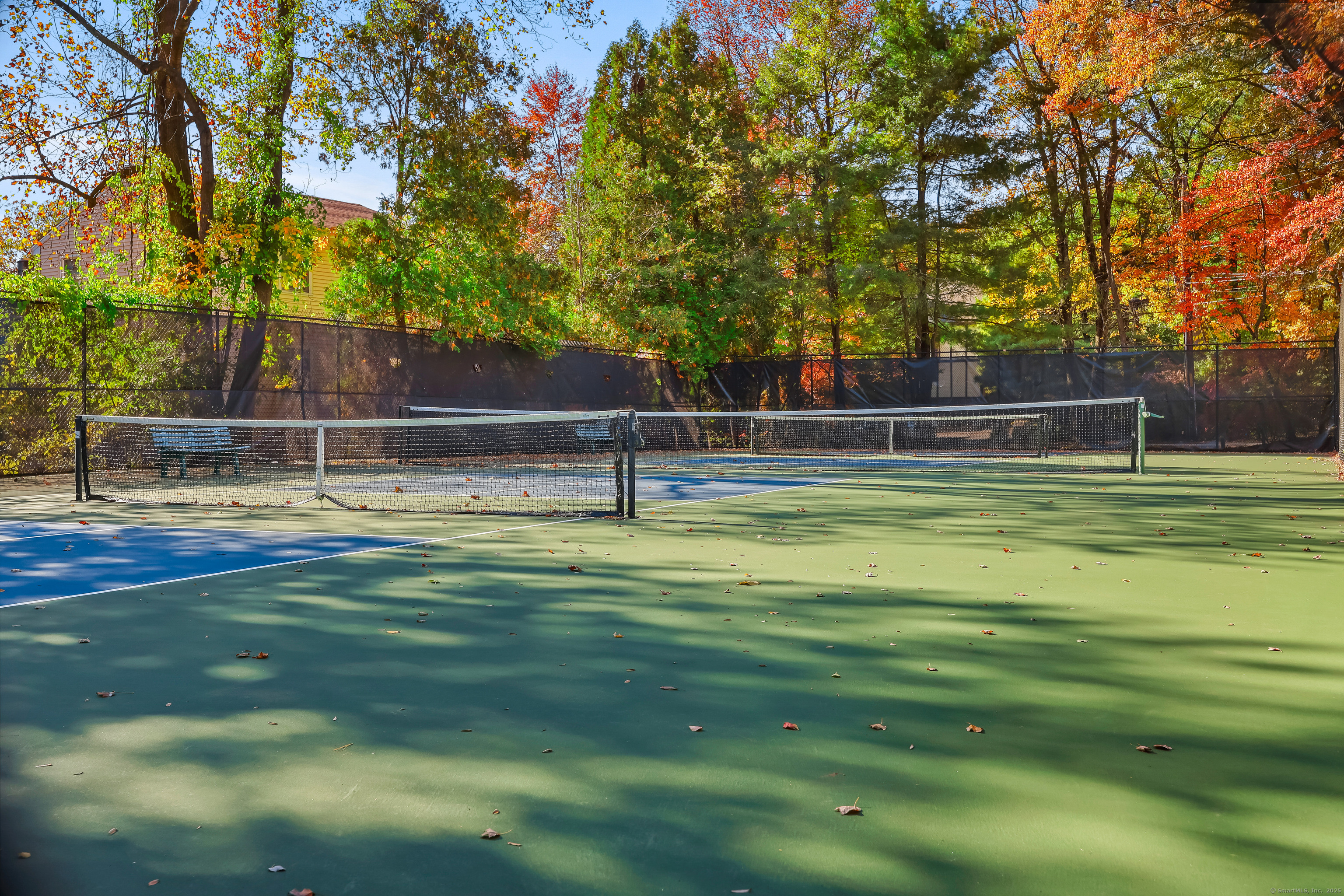 34 Sunrise Hill Road, Unit 34 Norwalk, CT 06851 - Photo 21 of 29 a view of a swimming pool with a patio