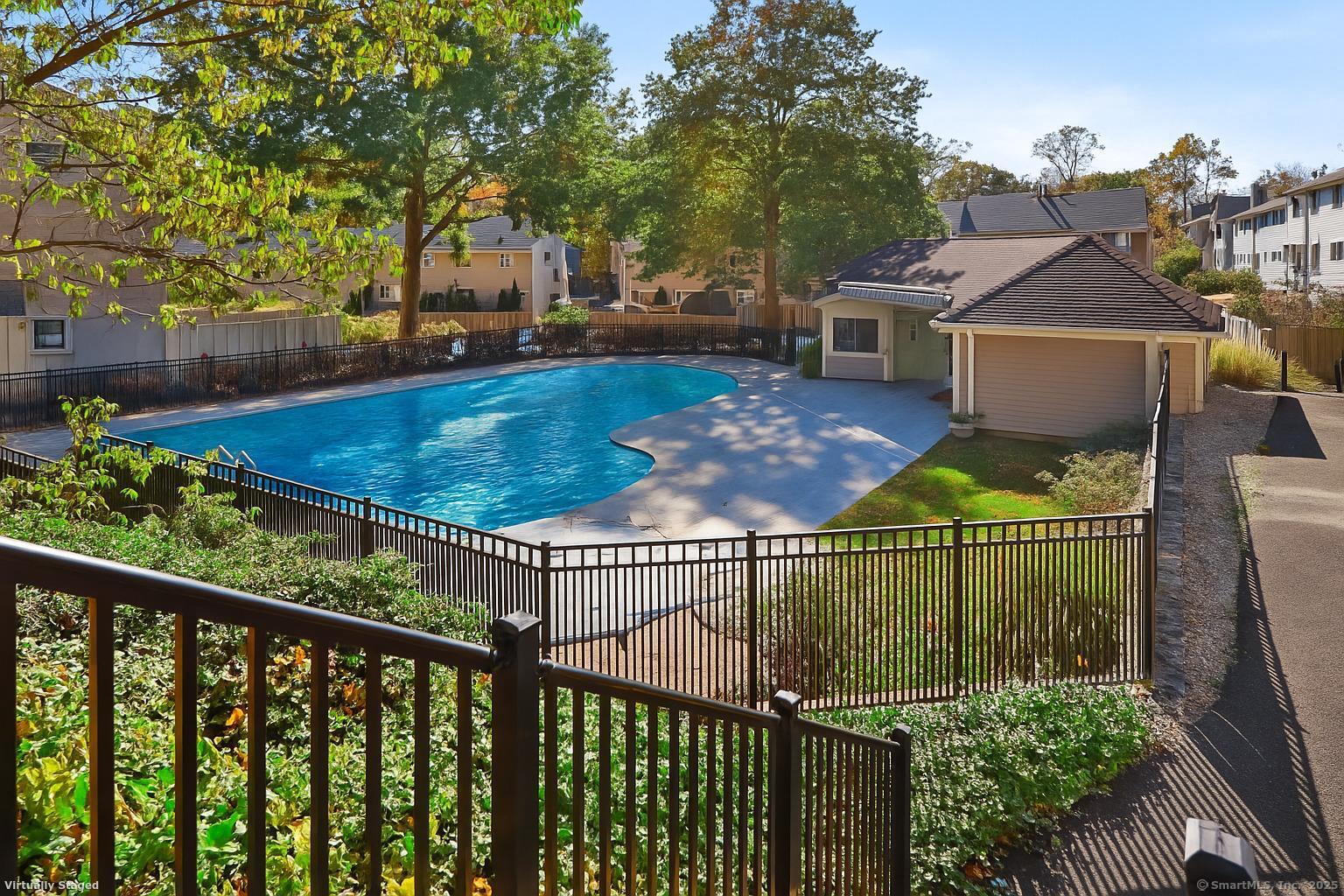 34 Sunrise Hill Road, Unit 34 Norwalk, CT 06851 - Photo 22 of 29 a view of a wrought iron fences in front of house