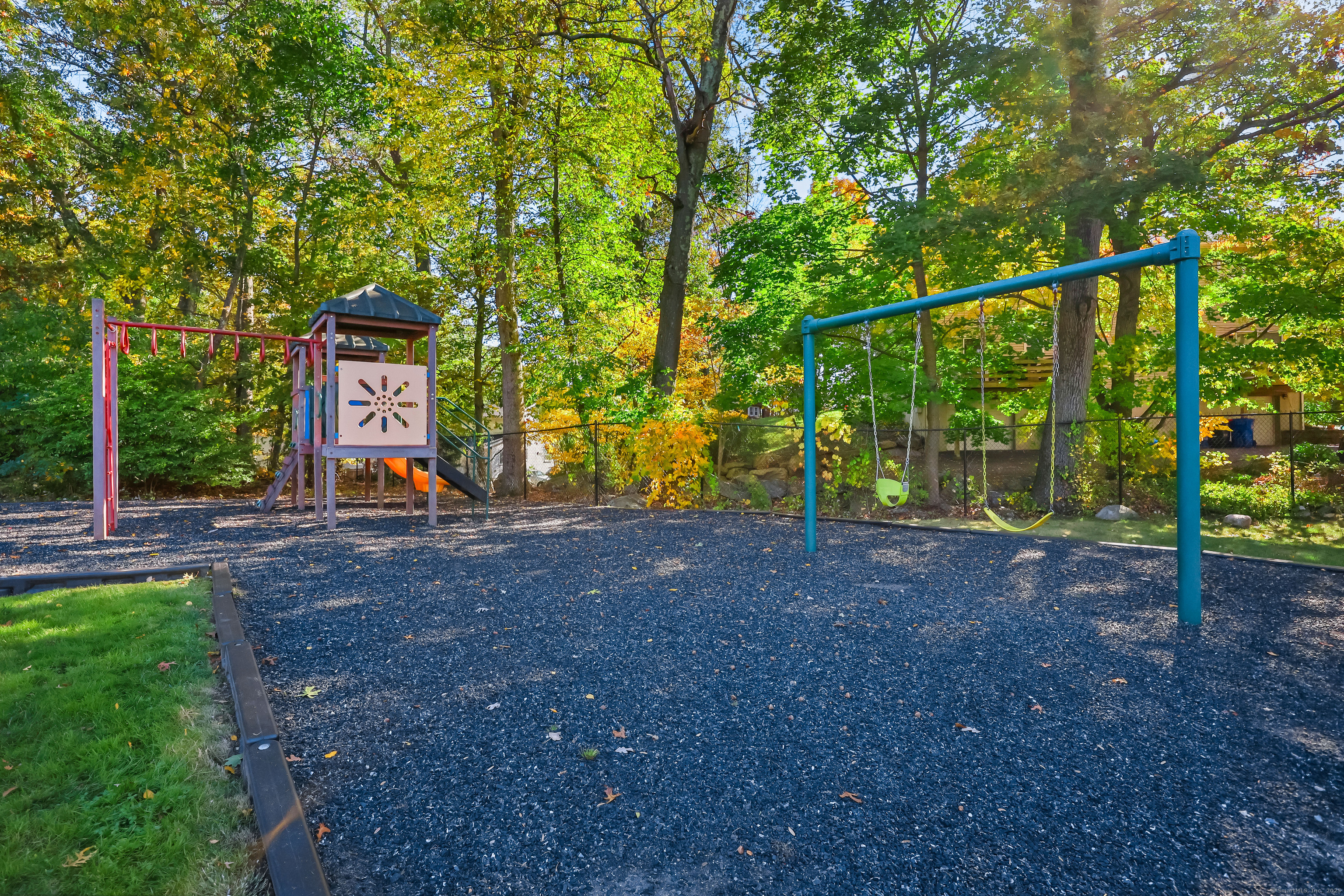 34 Sunrise Hill Road, Unit 34 Norwalk, CT 06851 - Photo 24 of 29 a view of a park with large trees