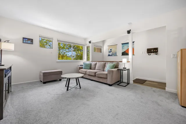 a living room with furniture and a couch