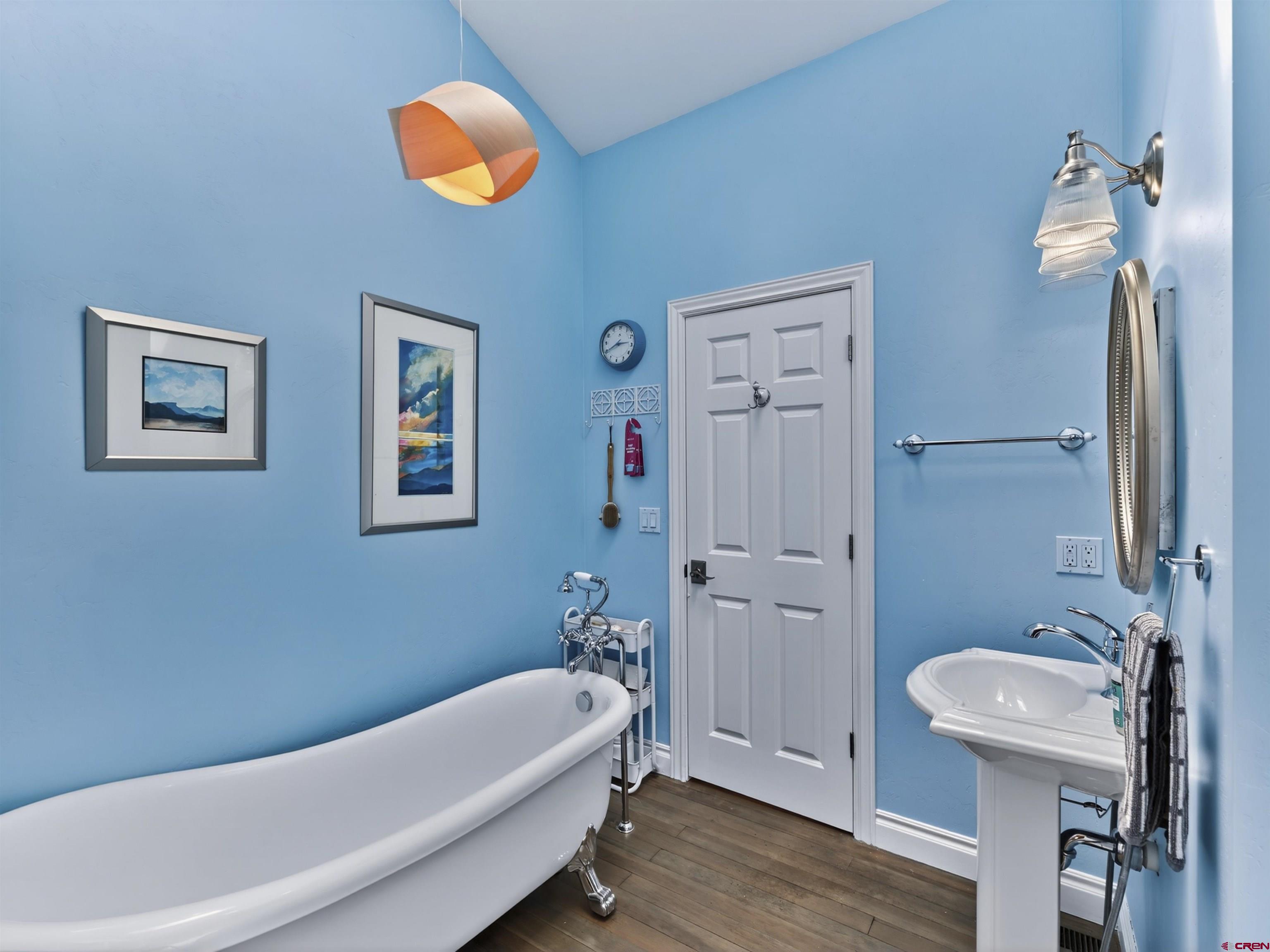 655 East 3rd Avenue Durango, CO 81301 - Photo 16 of 38 a bathroom with a bathtub and a sink