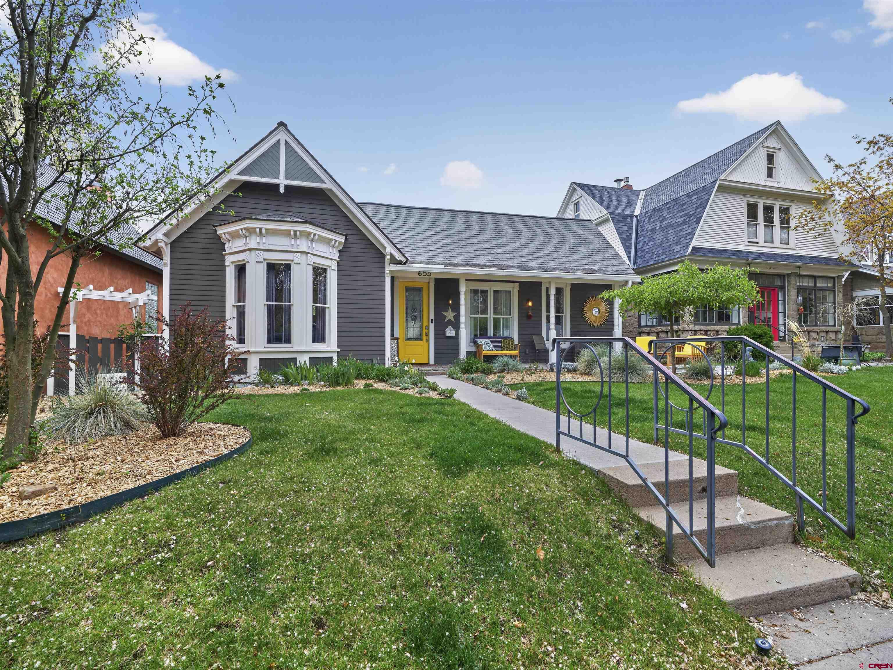 655 East 3rd Avenue Durango, CO 81301 - Photo 19 of 38 a front view of a house with a yard