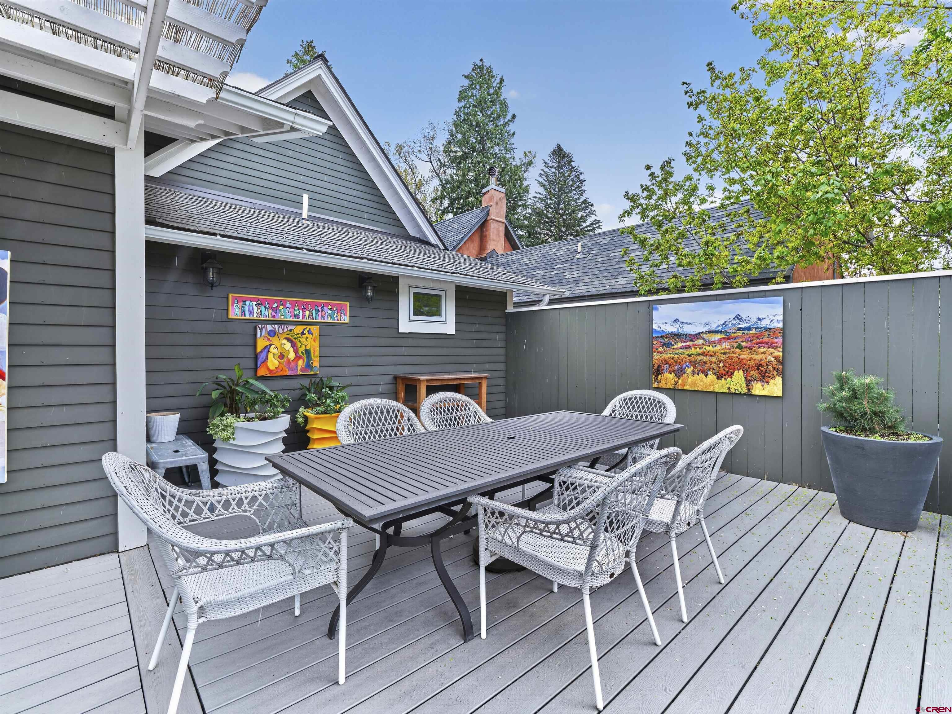 655 East 3rd Avenue Durango, CO 81301 - Photo 20 of 38 a view of a dinning table and chairs in patio of the house