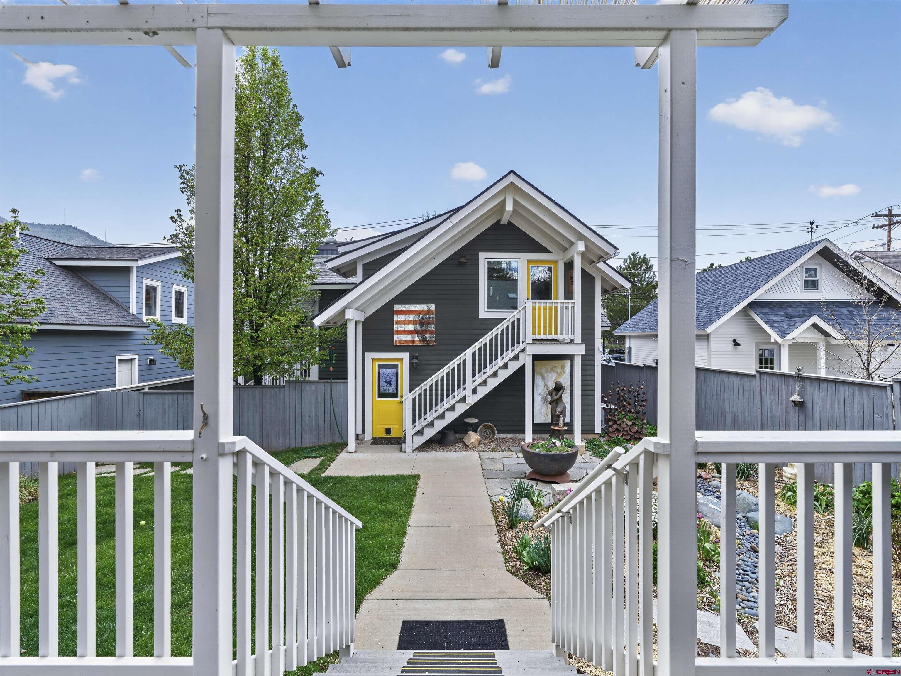 655 East 3rd Avenue Durango, CO 81301 - Photo 23 of 38 a front view of a house with yard
