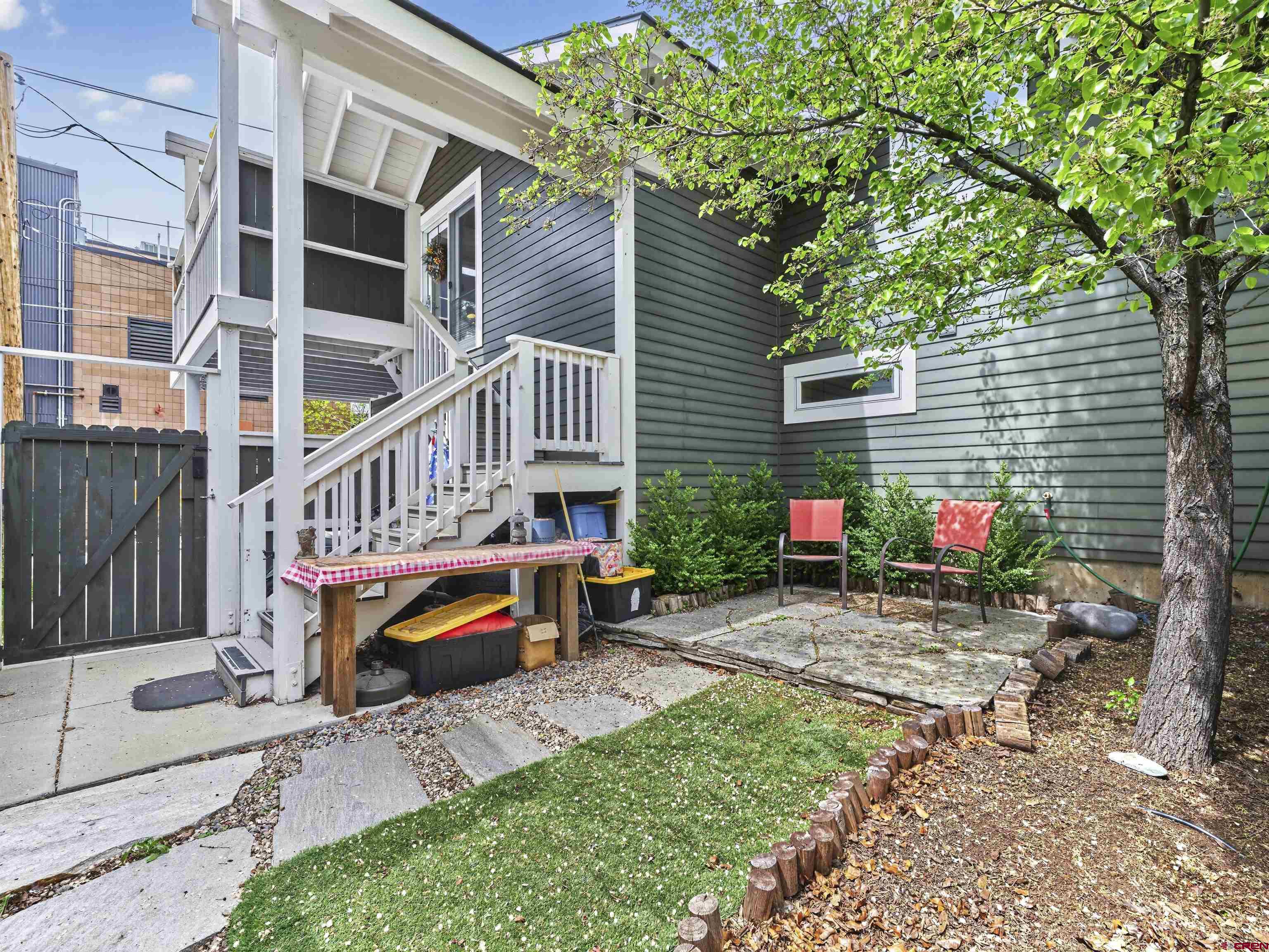 655 East 3rd Avenue Durango, CO 81301 - Photo 35 of 38 a view of a house with a deck and a backyard