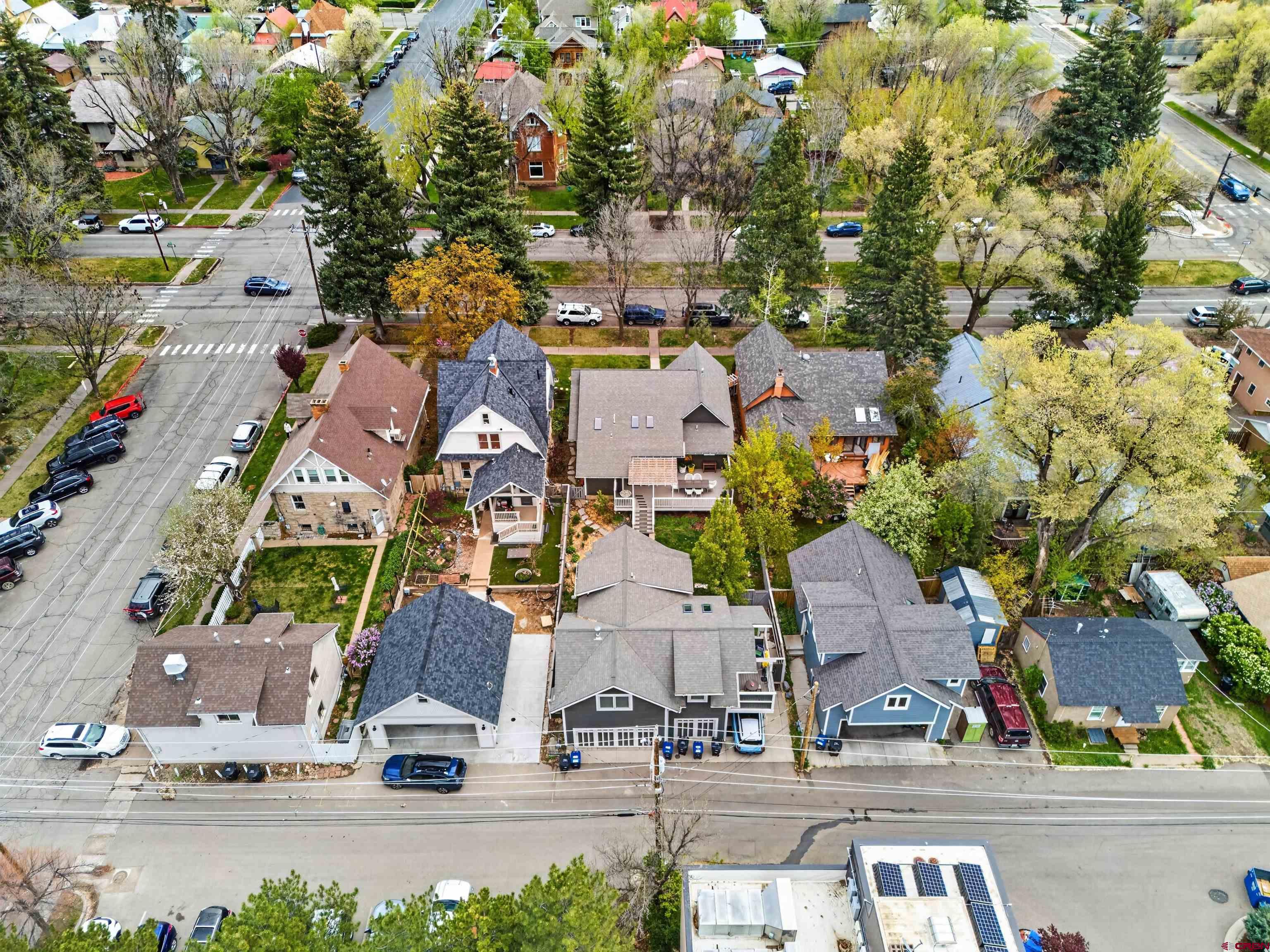 655 East 3rd Avenue Durango, CO 81301 - Photo 37 of 38 an aerial view of multiple houses with yard
