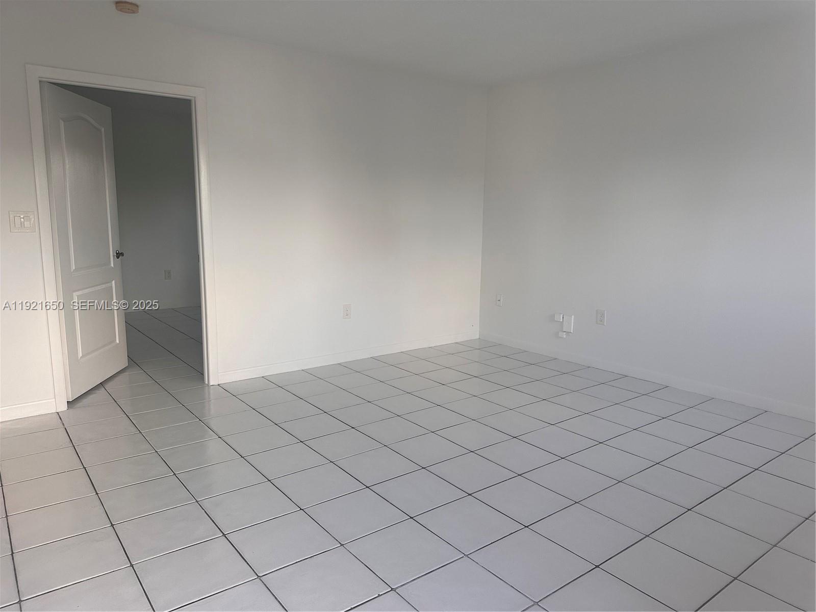 3052 Southwest 27th Avenue, Unit 301 Miami, FL 33133 - Photo 9 of 21 a view of a room and utility room