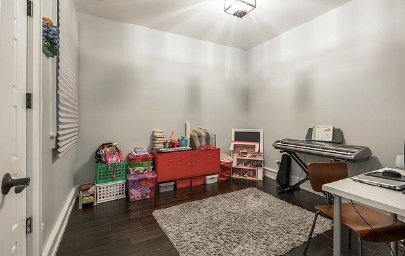 37 North Morgan Street, Unit 2 Chicago, IL 60607 - Photo 13 of 14 a living room with furniture and a rug
