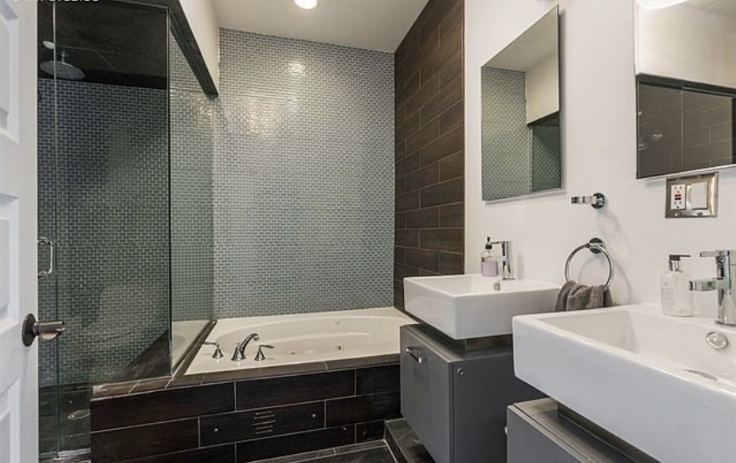 37 North Morgan Street, Unit 2 Chicago, IL 60607 - Photo 10 of 14 a bathroom with a sink and a mirror