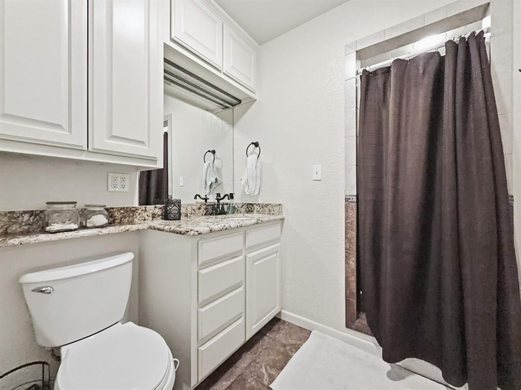 206 Navajo Trail Hamilton, TX 76531 - Photo 25 of 39 Full bath featuring a stall shower and vanity