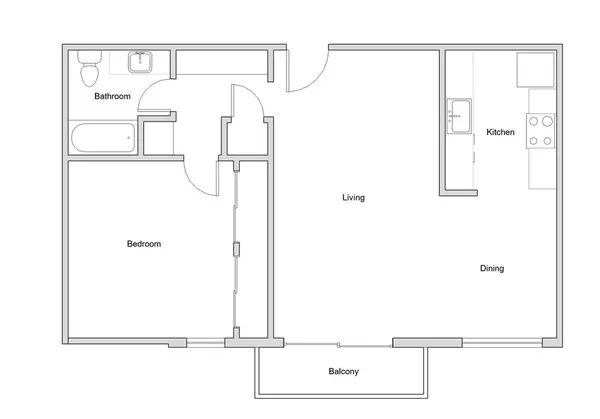 a front view of a building with a yard