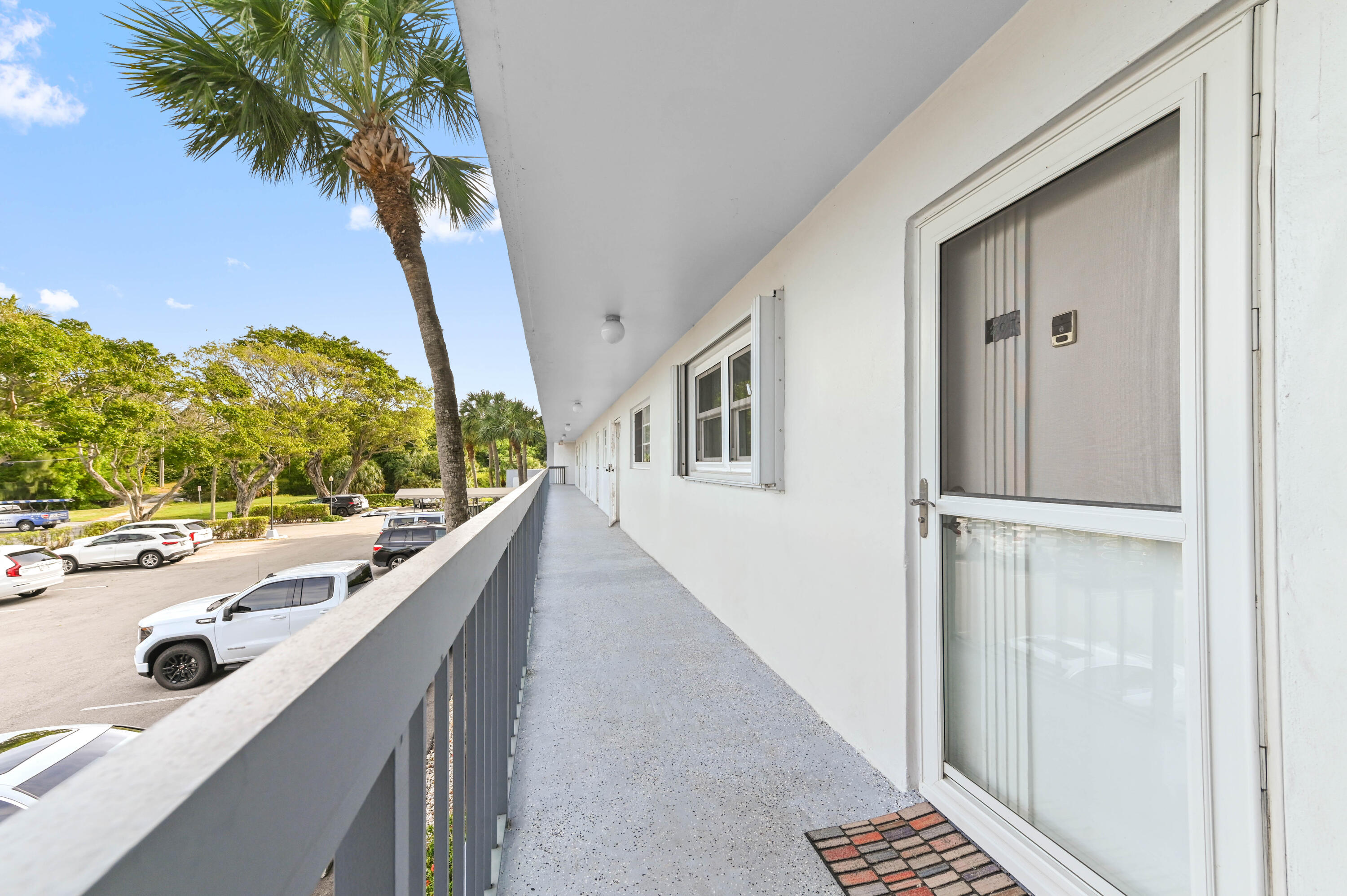 198 Northwest 67th Street, Unit 207 Boca Raton, FL 33487 - Photo 4 of 42 a bathroom with a sink and a mirror